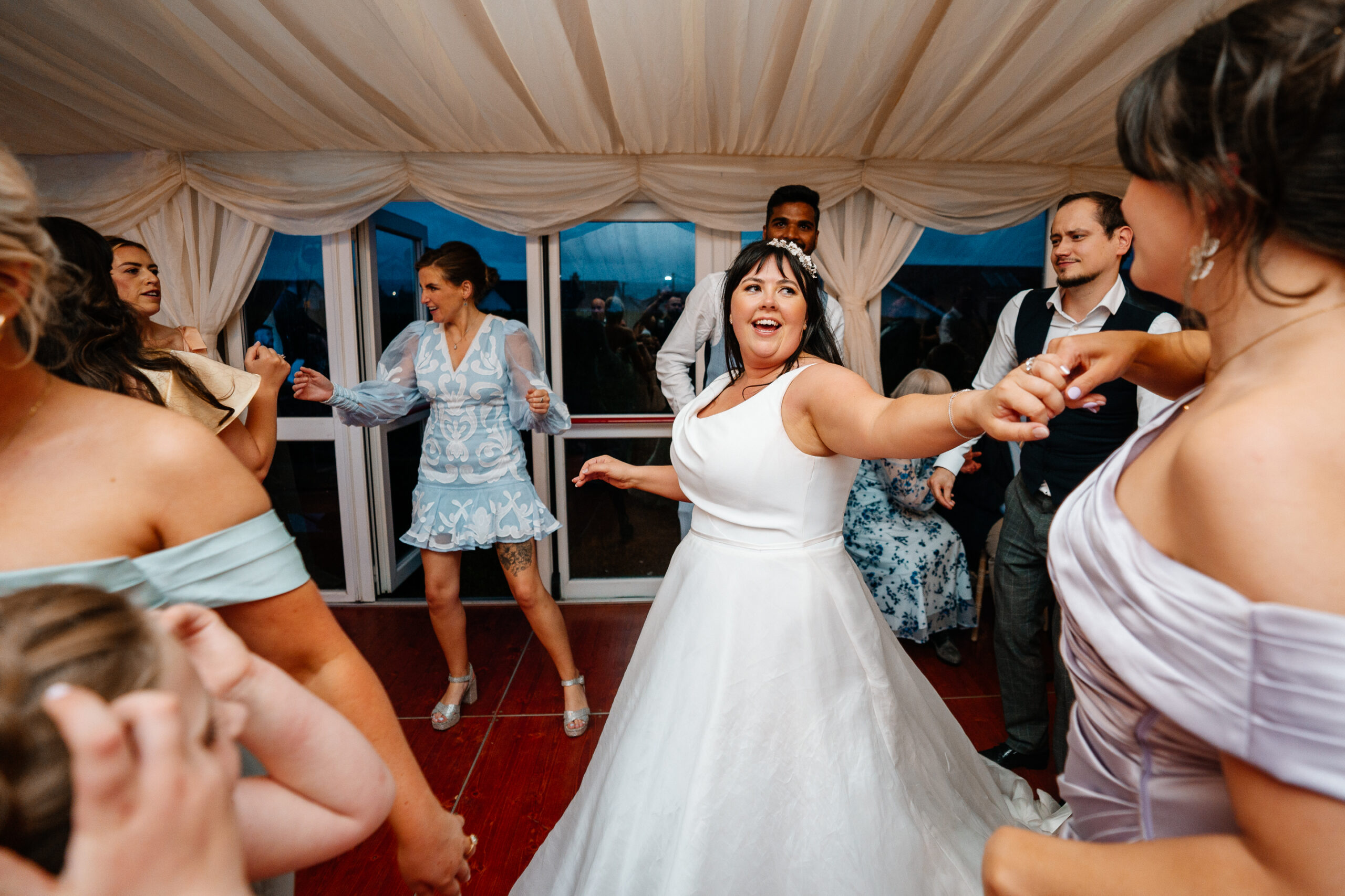 Guests dancing and celebrating on the wedding dancefloor near Markree Castle