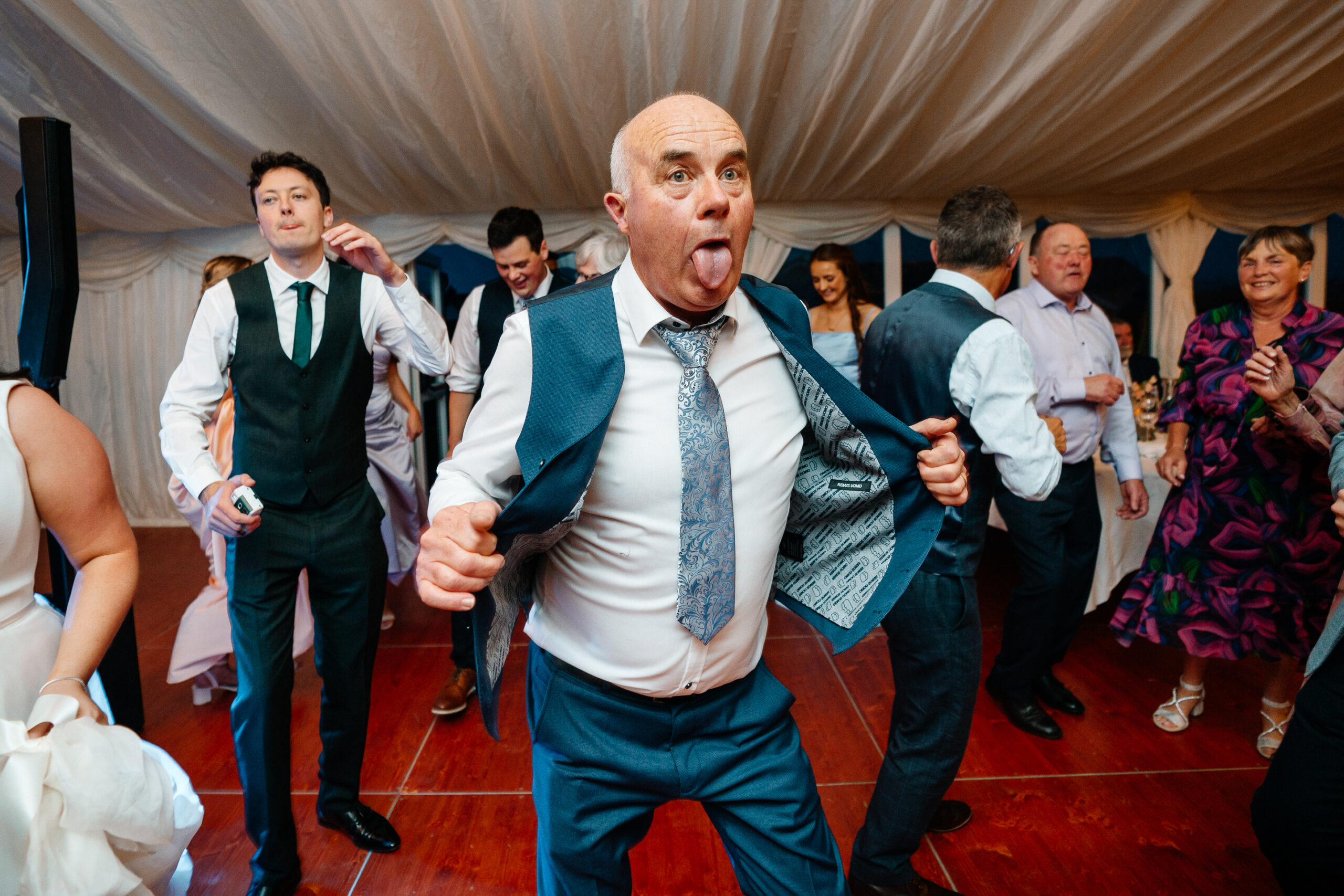 Guests dancing and celebrating on the wedding dancefloor near Markree Castle