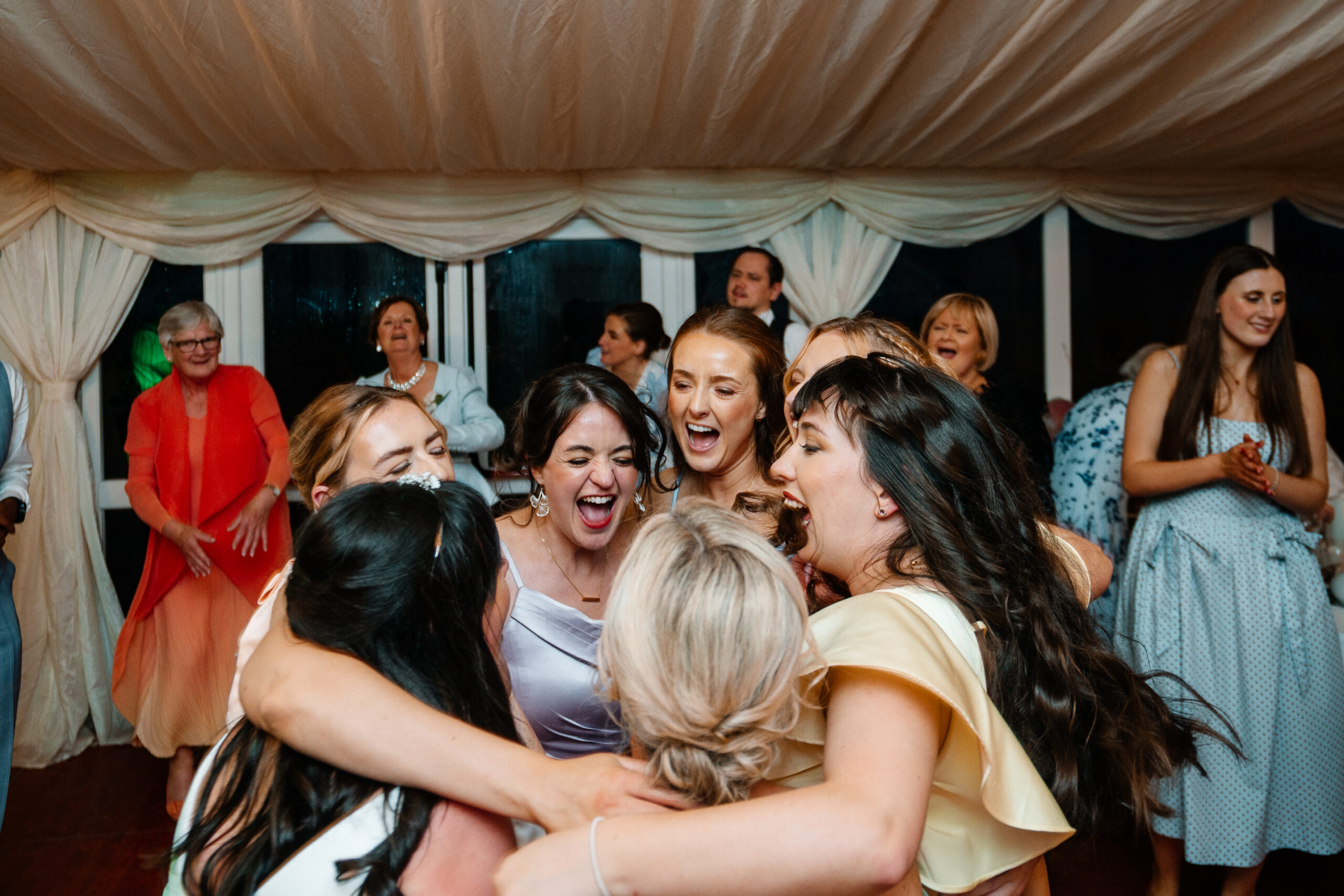 Guests dancing and celebrating on the wedding dancefloor near Markree Castle