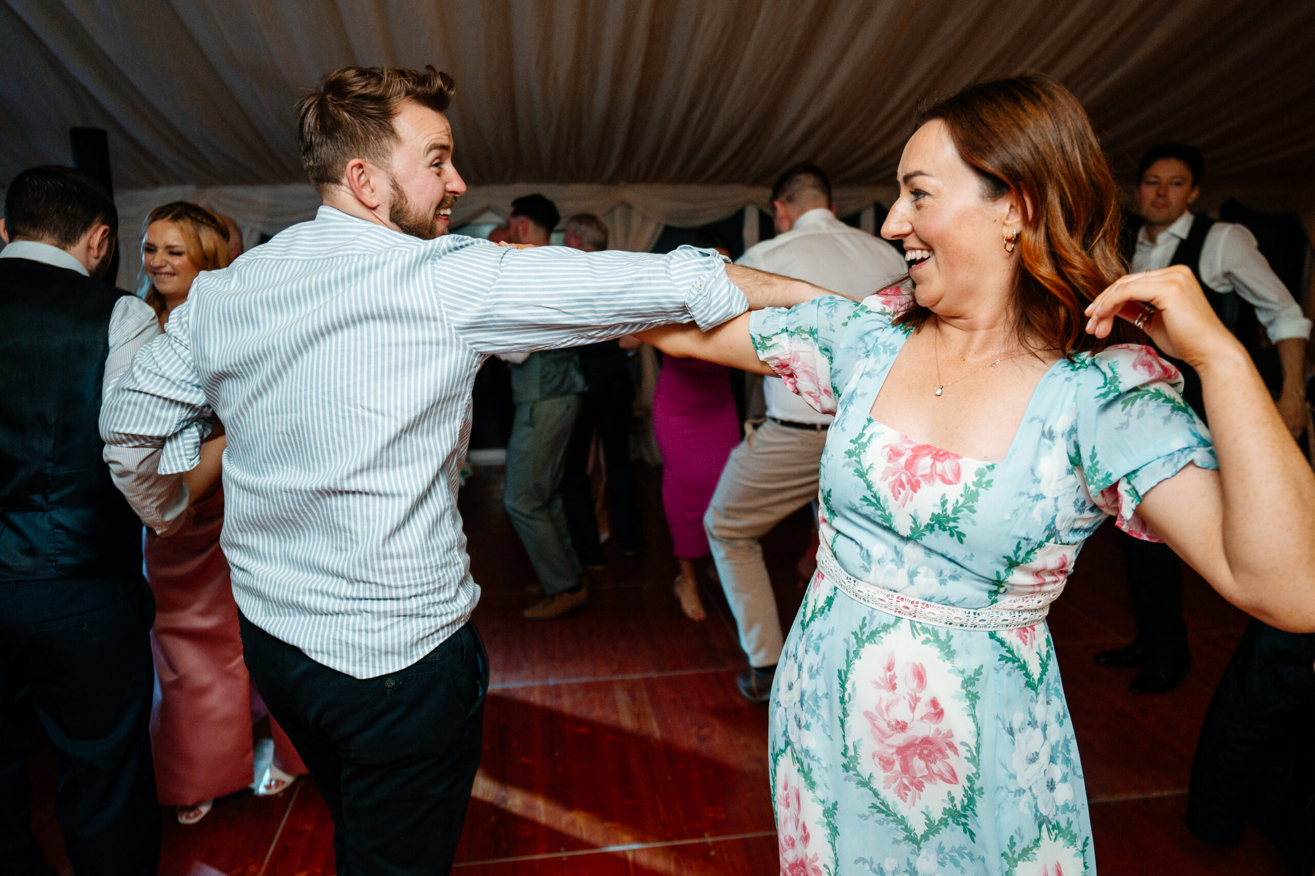 Guests dancing and celebrating on the wedding dancefloor near Markree Castle