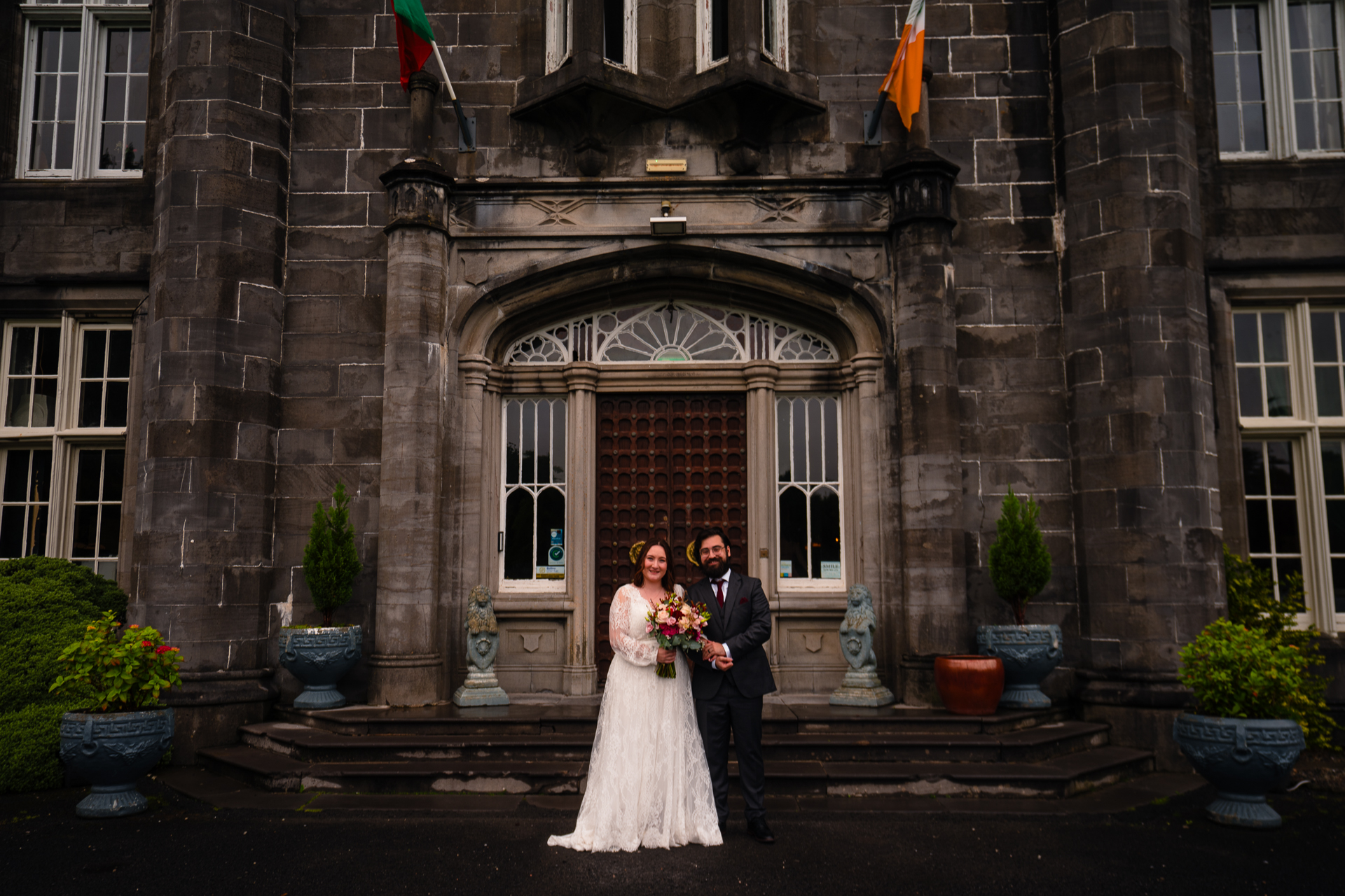 Romantic intimate wedding portrait in Belleek Woods and garden after rain