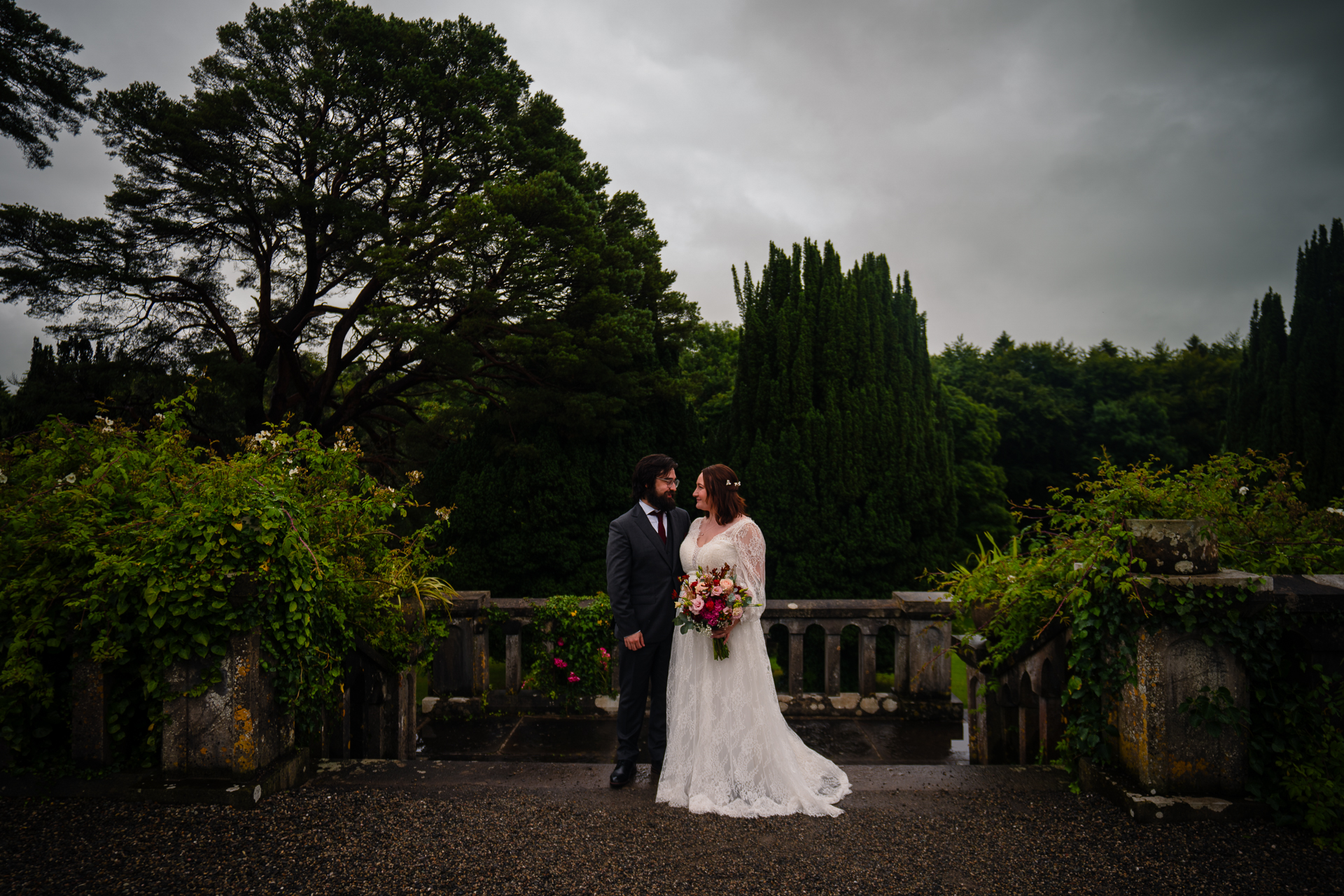 Romantic intimate wedding portrait in Belleek Woods and garden after rain