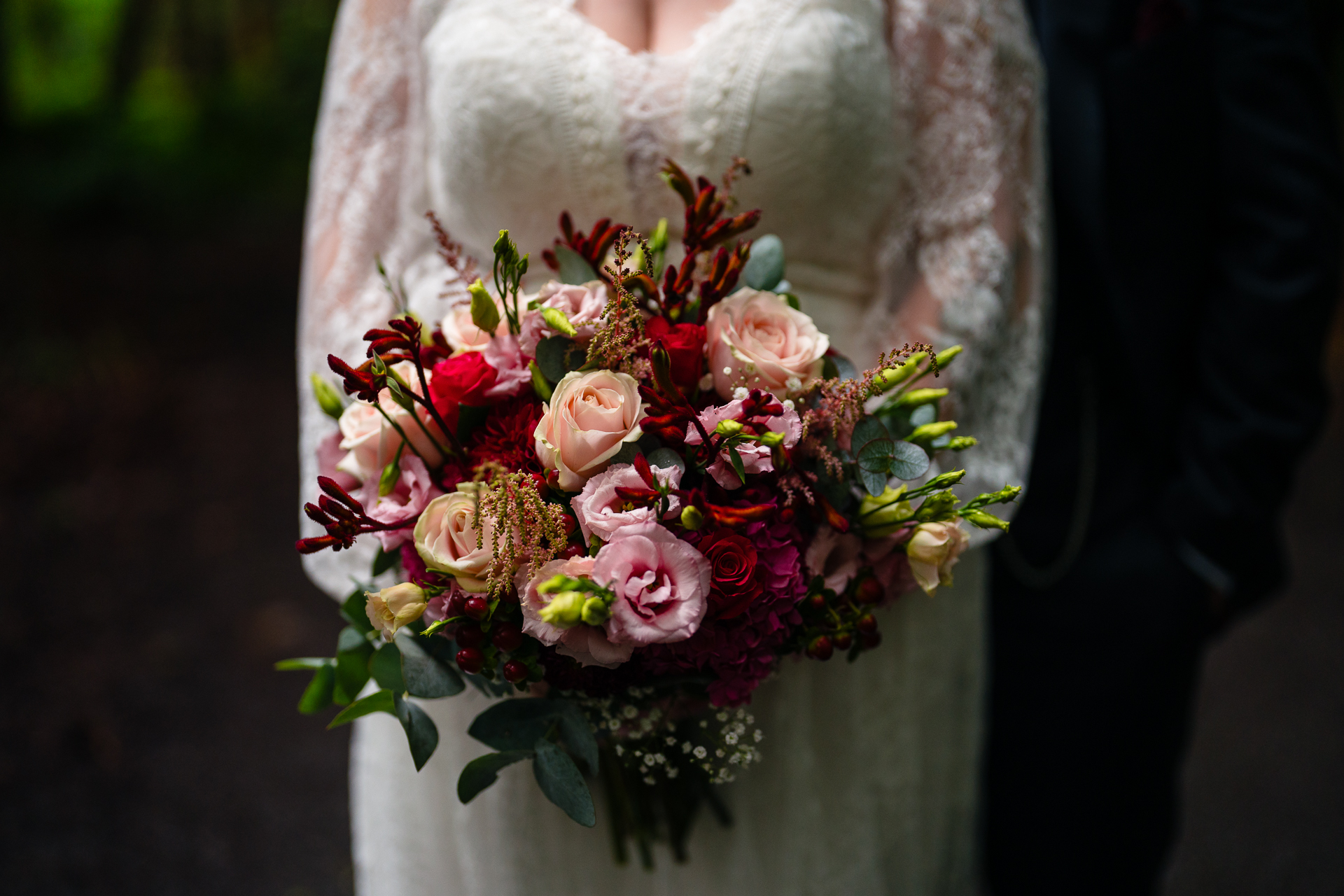 Romantic intimate wedding portrait in Belleek Woods and garden after rain