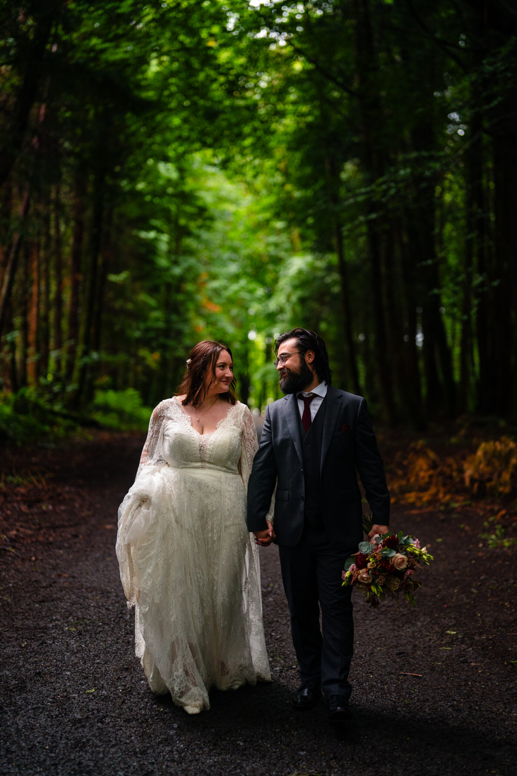 Romantic intimate wedding portrait in Belleek Woods and garden after rain
