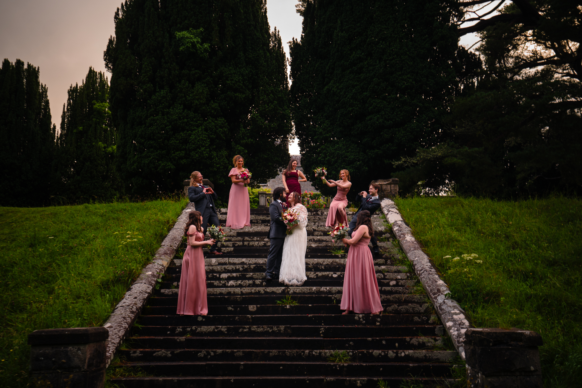 Romantic intimate wedding portrait in Belleek Woods and garden after rain