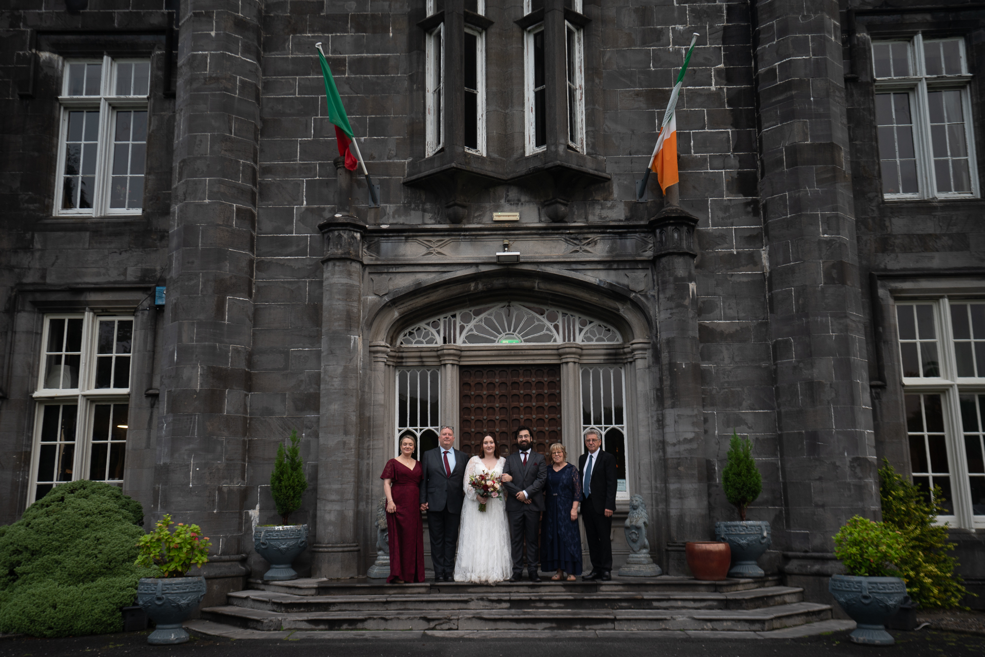 Romantic intimate wedding portrait in Belleek Woods and garden after rain