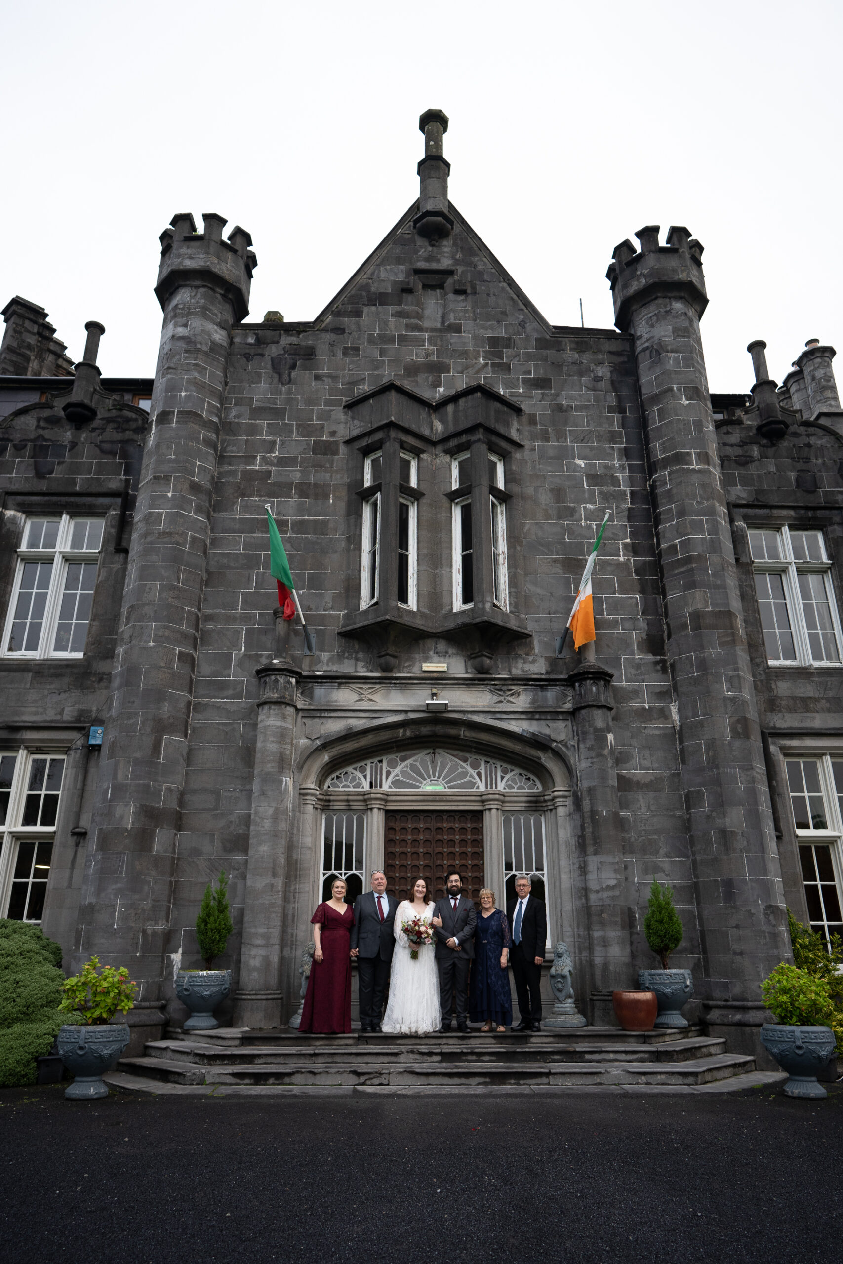 Romantic intimate wedding portrait in Belleek Woods and garden after rain