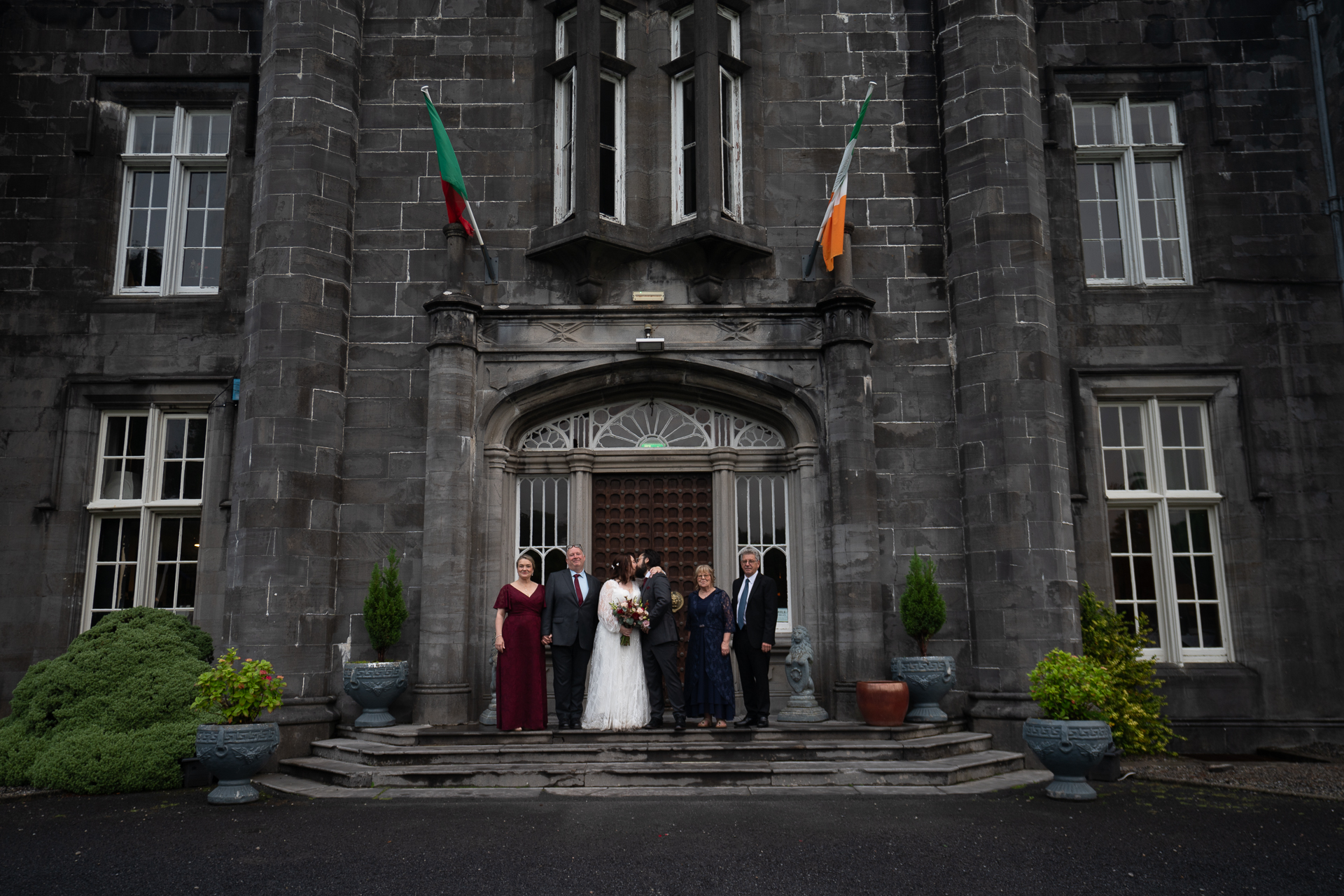 Romantic intimate wedding portrait in Belleek Woods and garden after rain