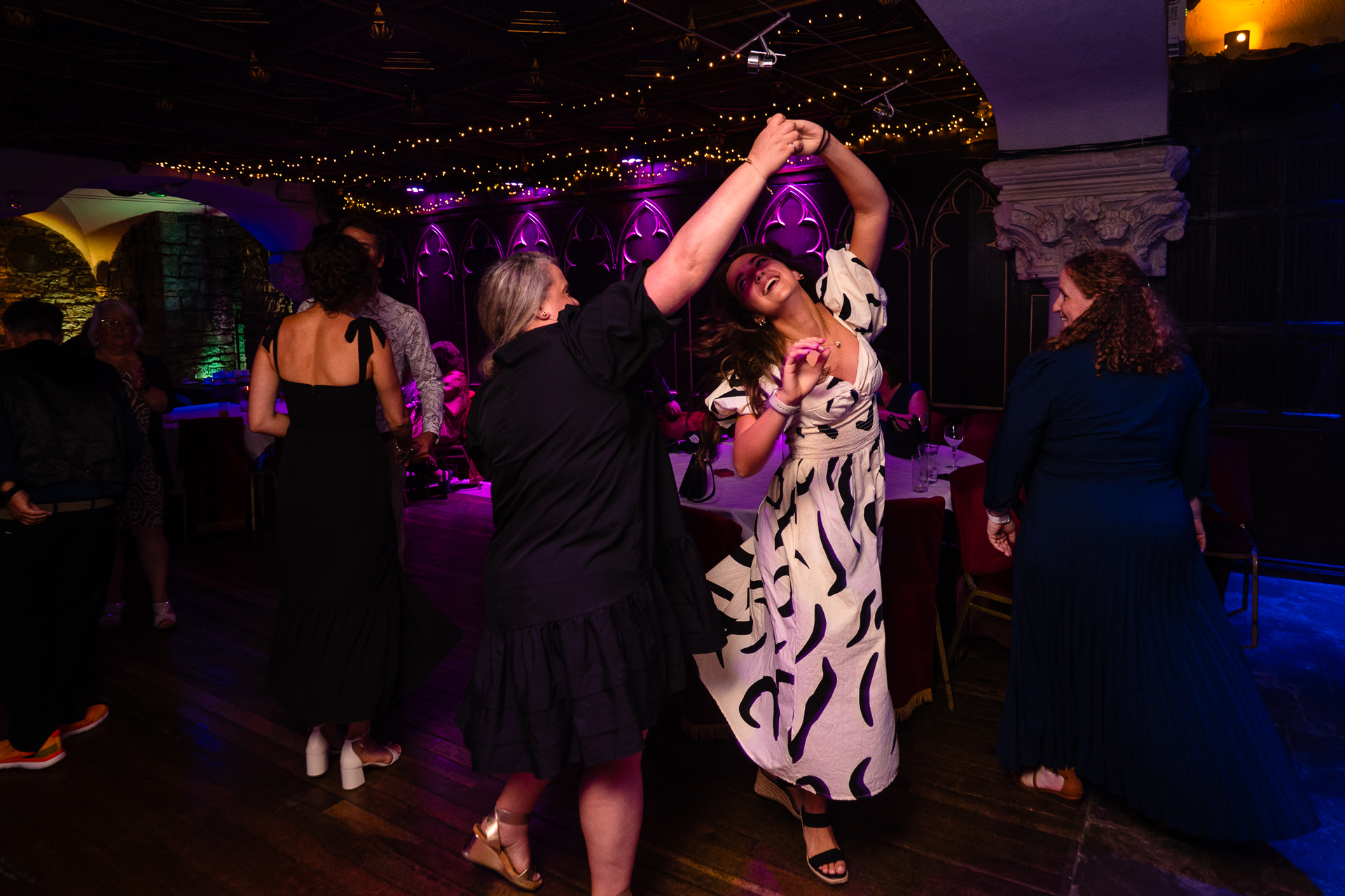 Couple’s first dance in historic ballroom at Belleek Castle during intimate destination wedding