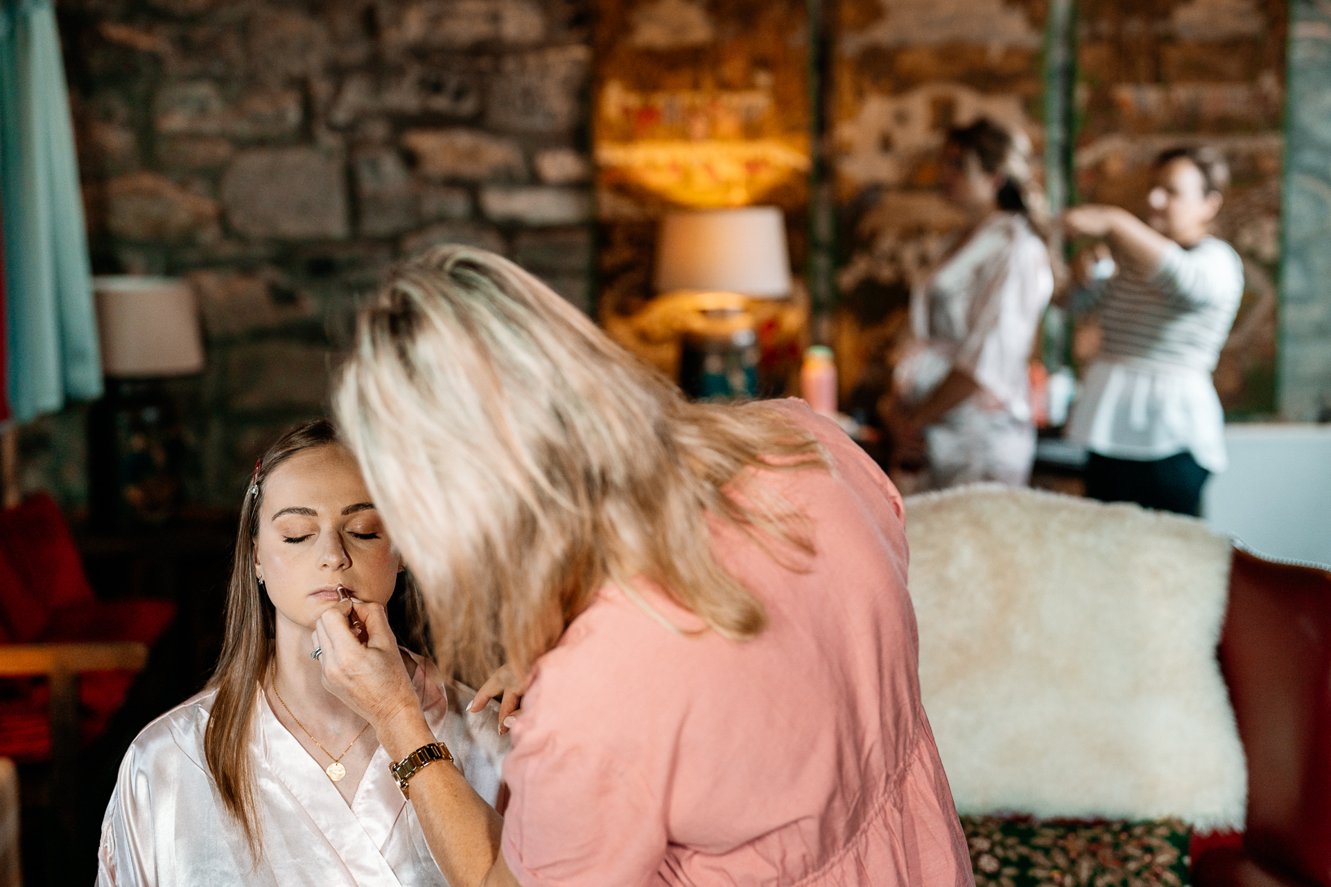 Bride getting ready in Cloghan Castle before her intimate destination wedding