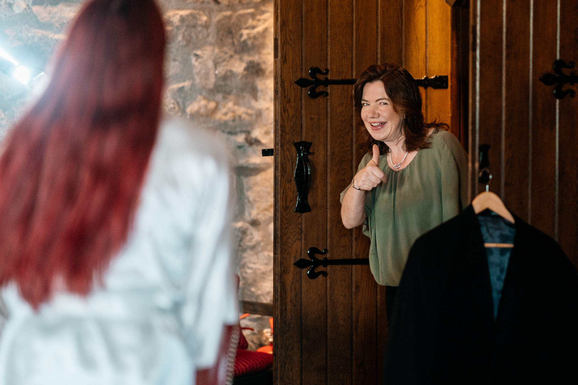 Bride getting ready in Cloghan Castle before her intimate destination wedding