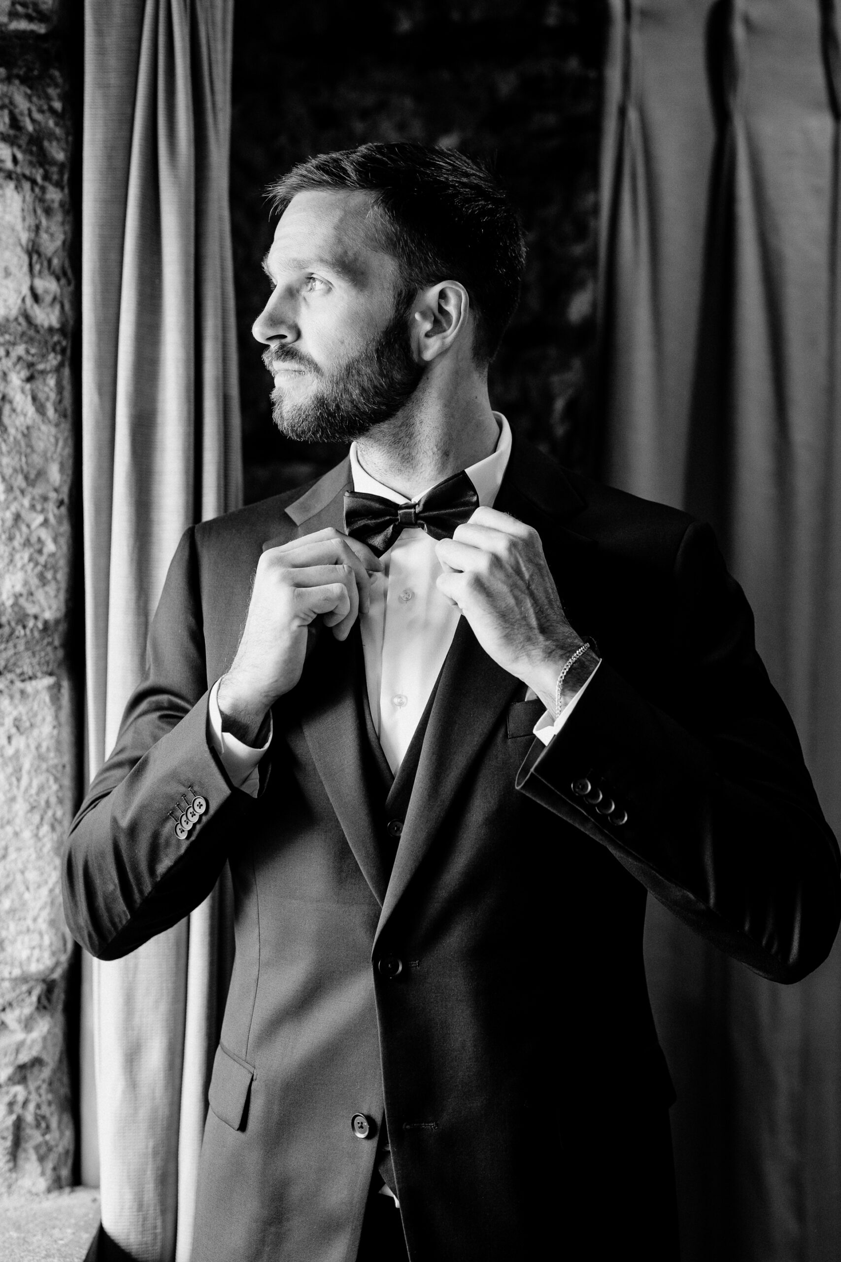 Groom getting ready at Cloghan Castle before his destination wedding