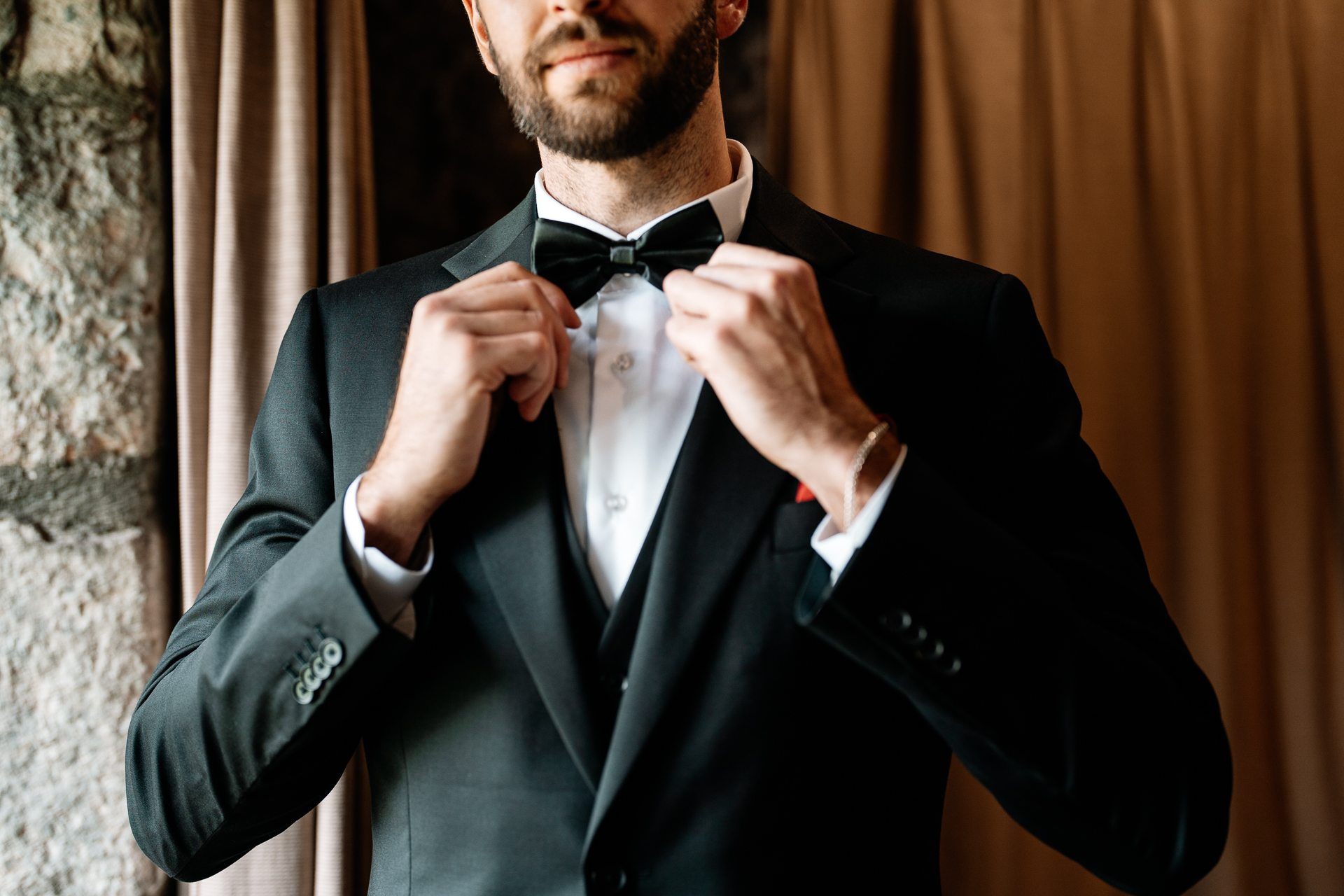 Groom getting ready at Cloghan Castle before his destination wedding