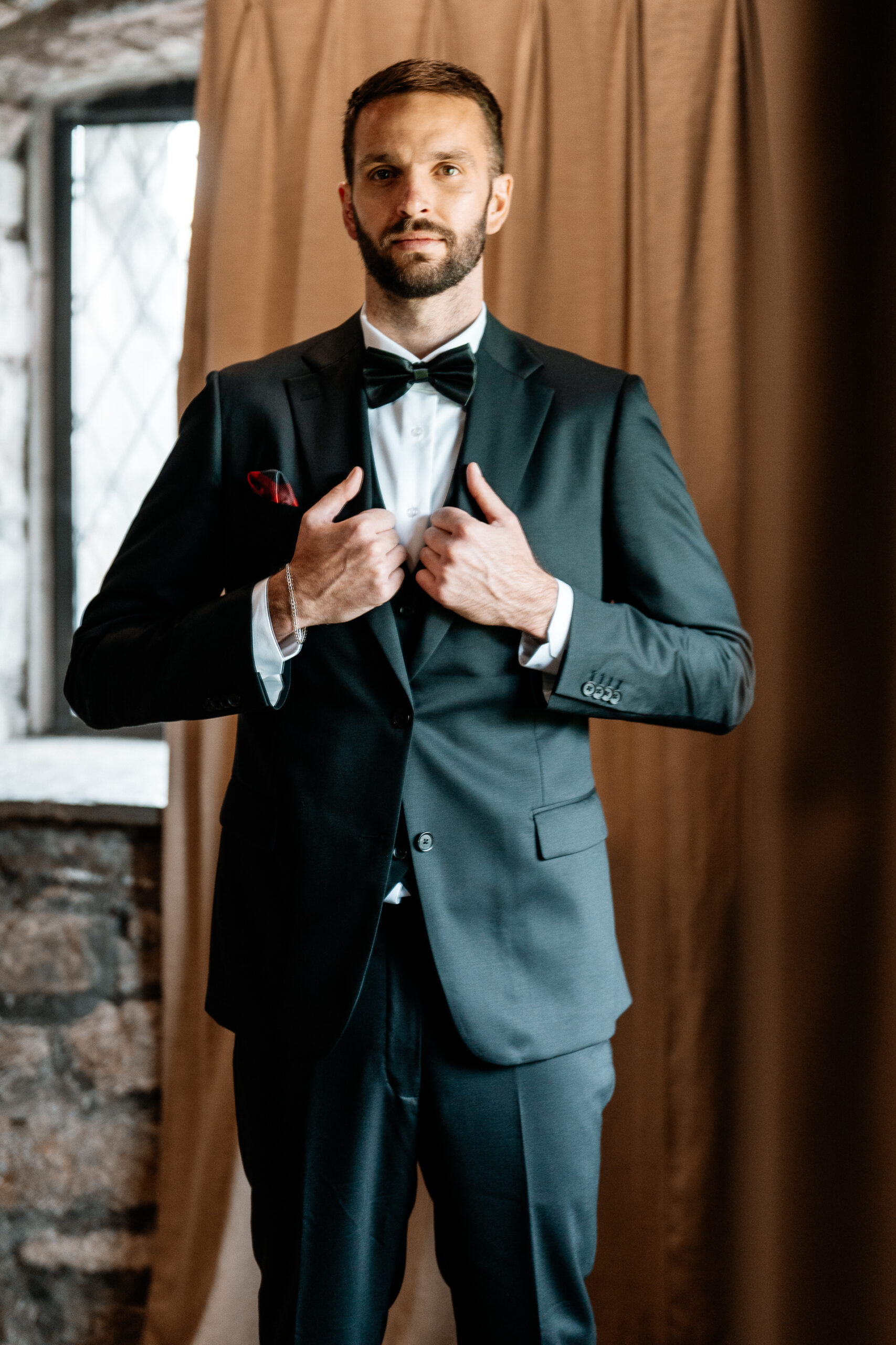 Groom getting ready at Cloghan Castle before his destination wedding