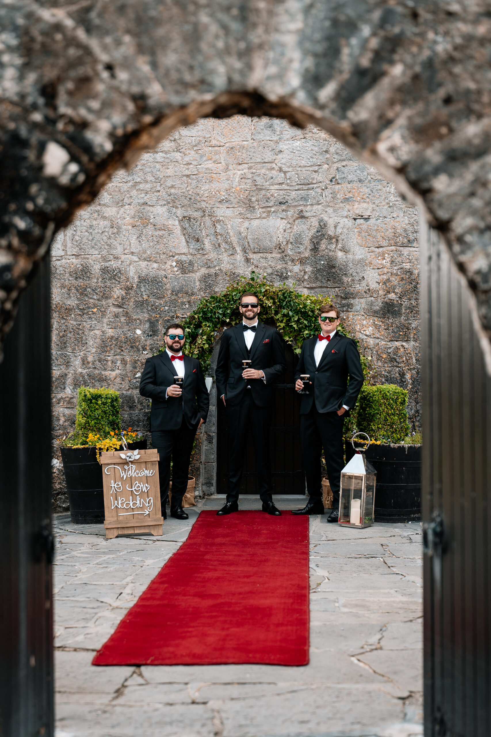 Documentary-style groom prep in the stylish interiors of Cloghan Castle