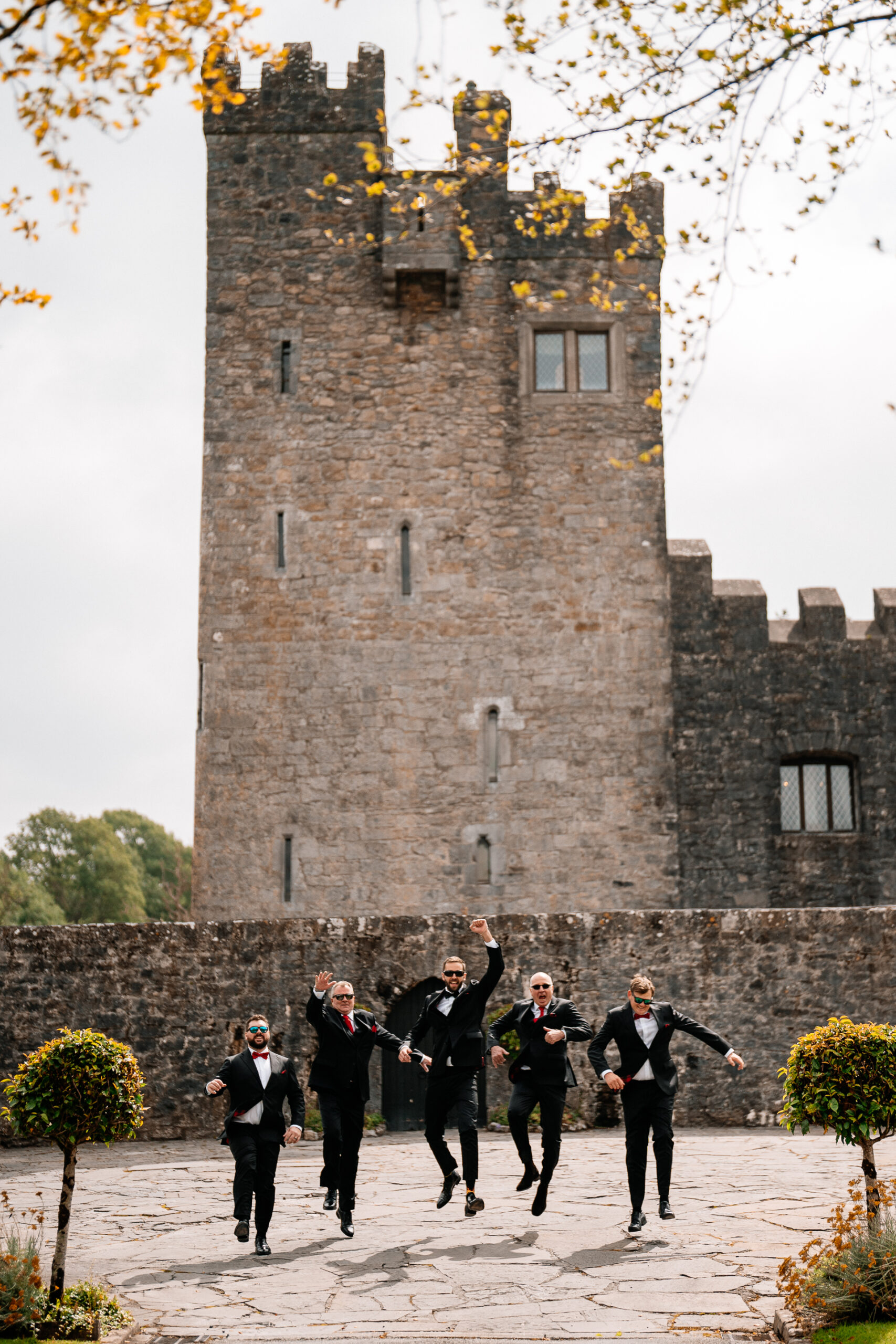 Documentary-style groom prep in the stylish interiors of Cloghan Castle