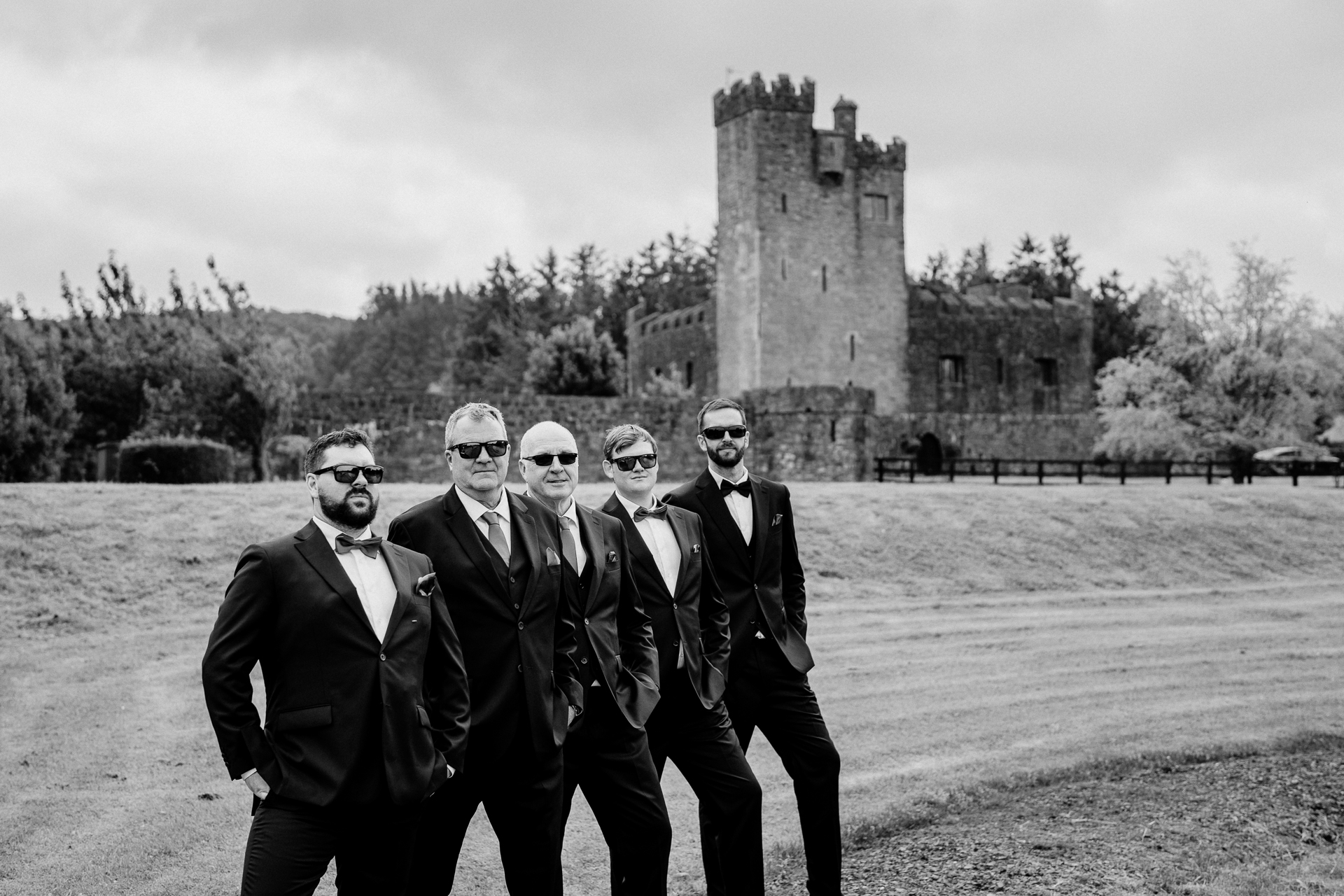 Documentary-style groom prep in the stylish interiors of Cloghan Castle