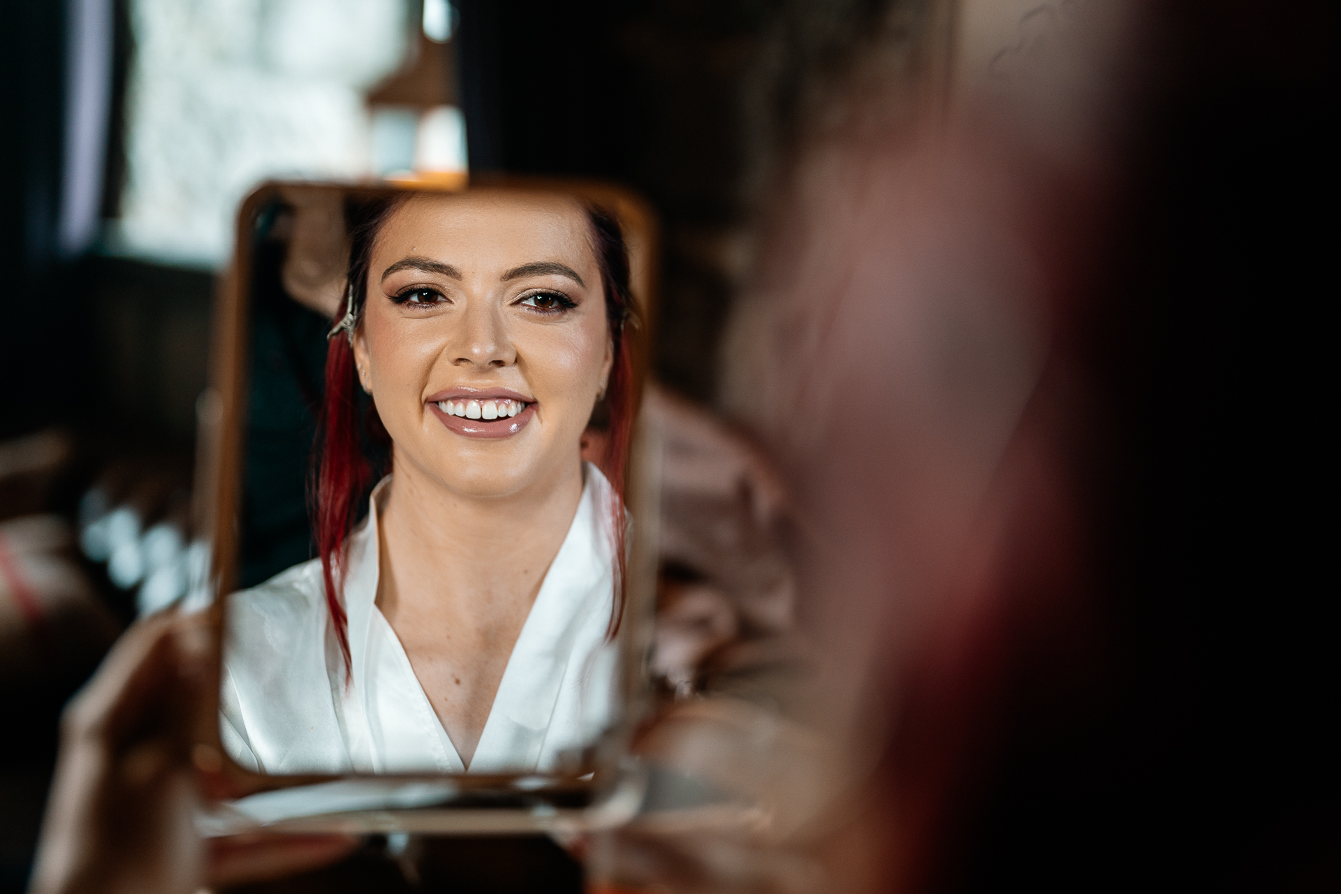 Bride getting ready in Cloghan Castle before her intimate destination wedding