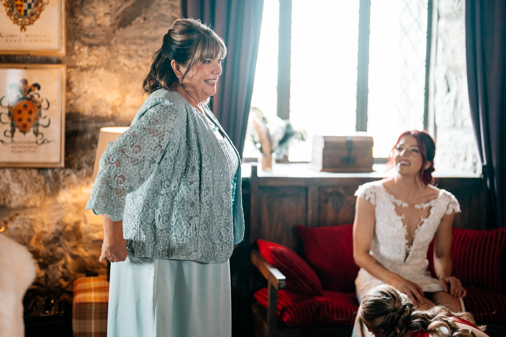 Bride getting ready in Cloghan Castle before her intimate destination wedding