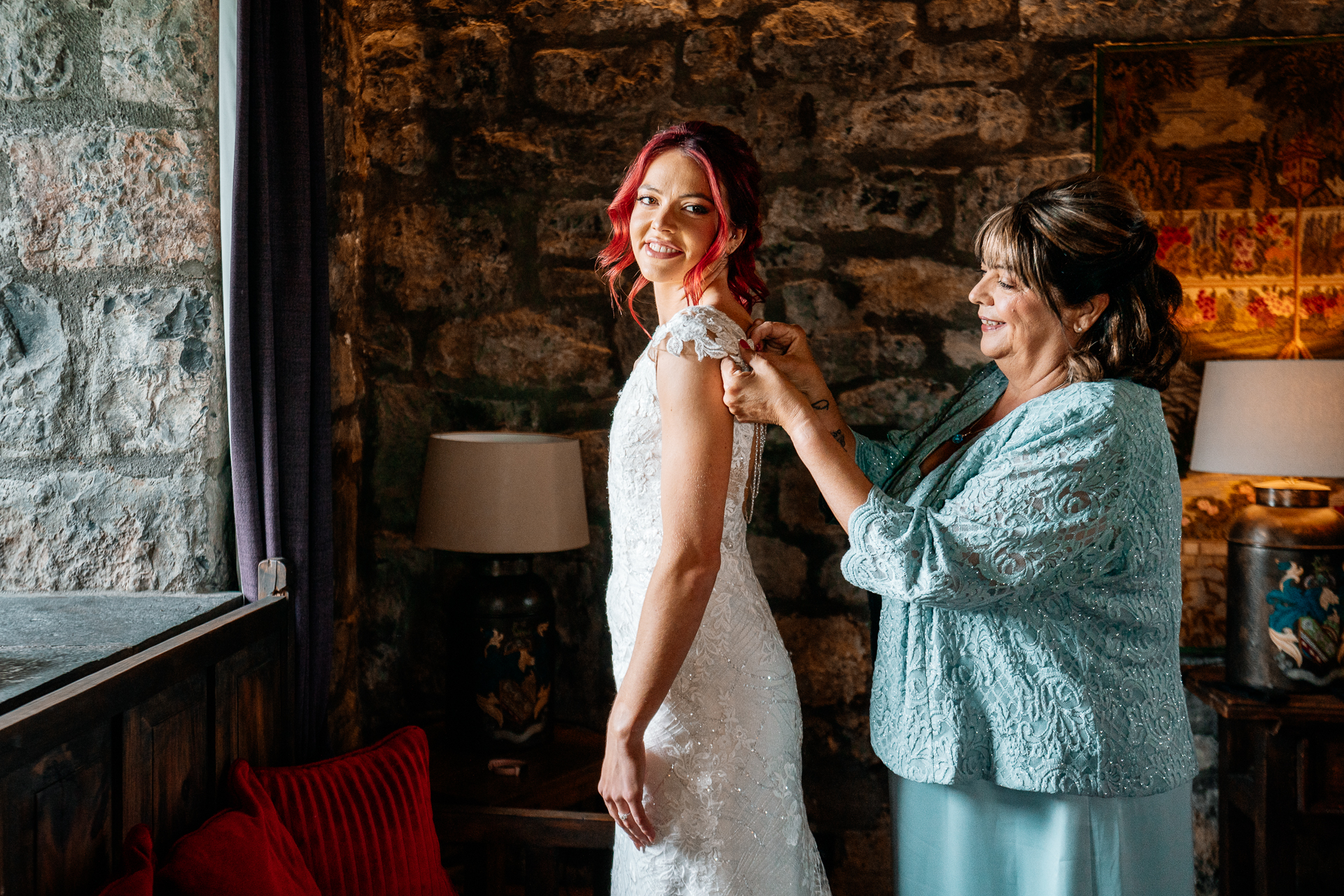 Bride getting ready in Cloghan Castle before her intimate destination wedding