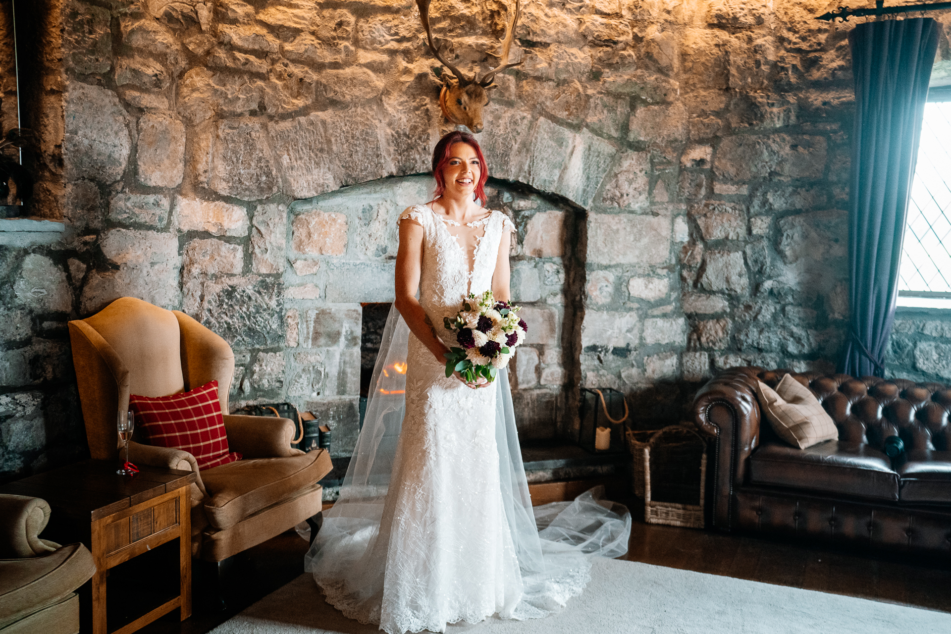 Bride getting ready in Cloghan Castle before her intimate destination wedding