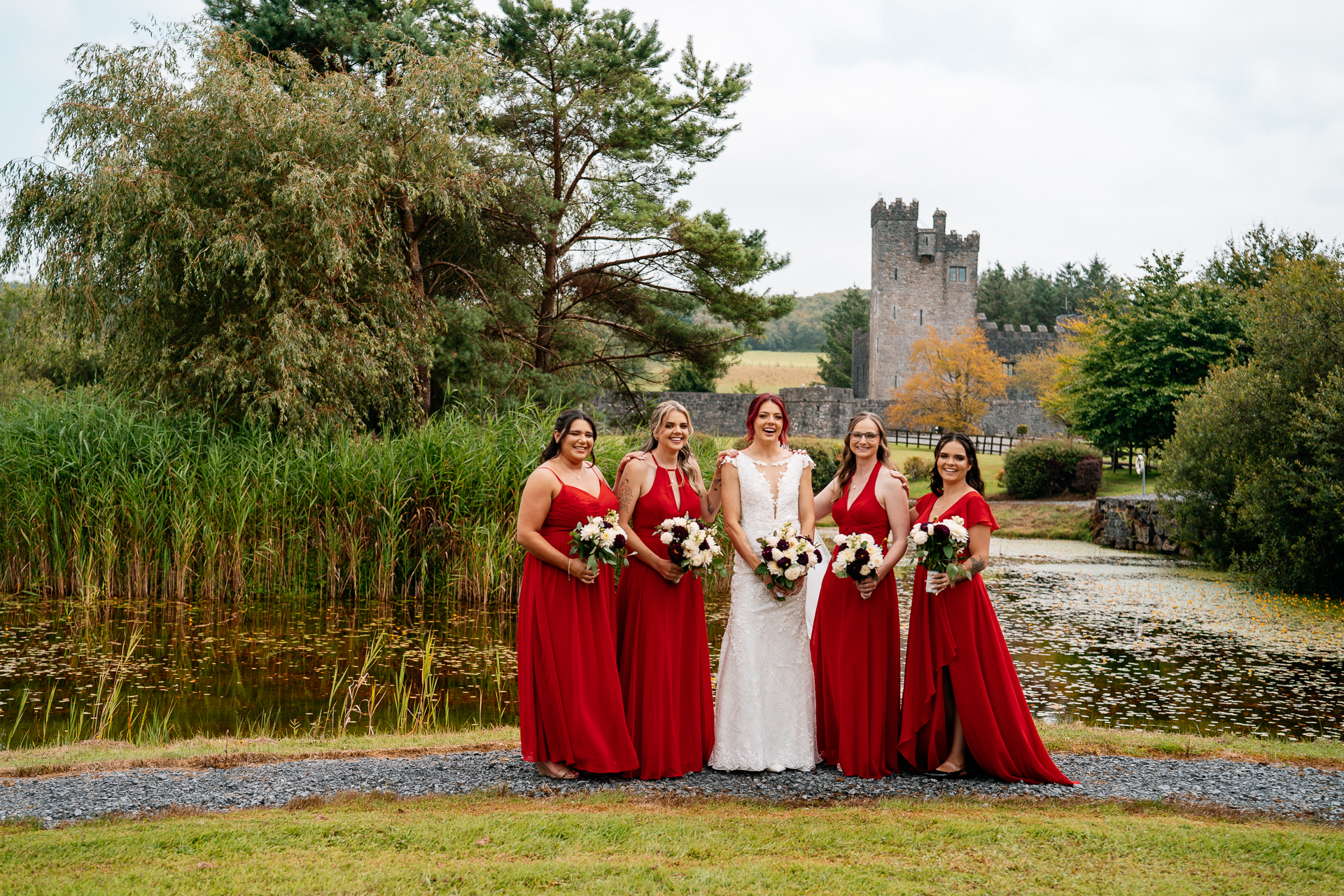 Bride with bridesmaids in the gardens of Cloghan Castle