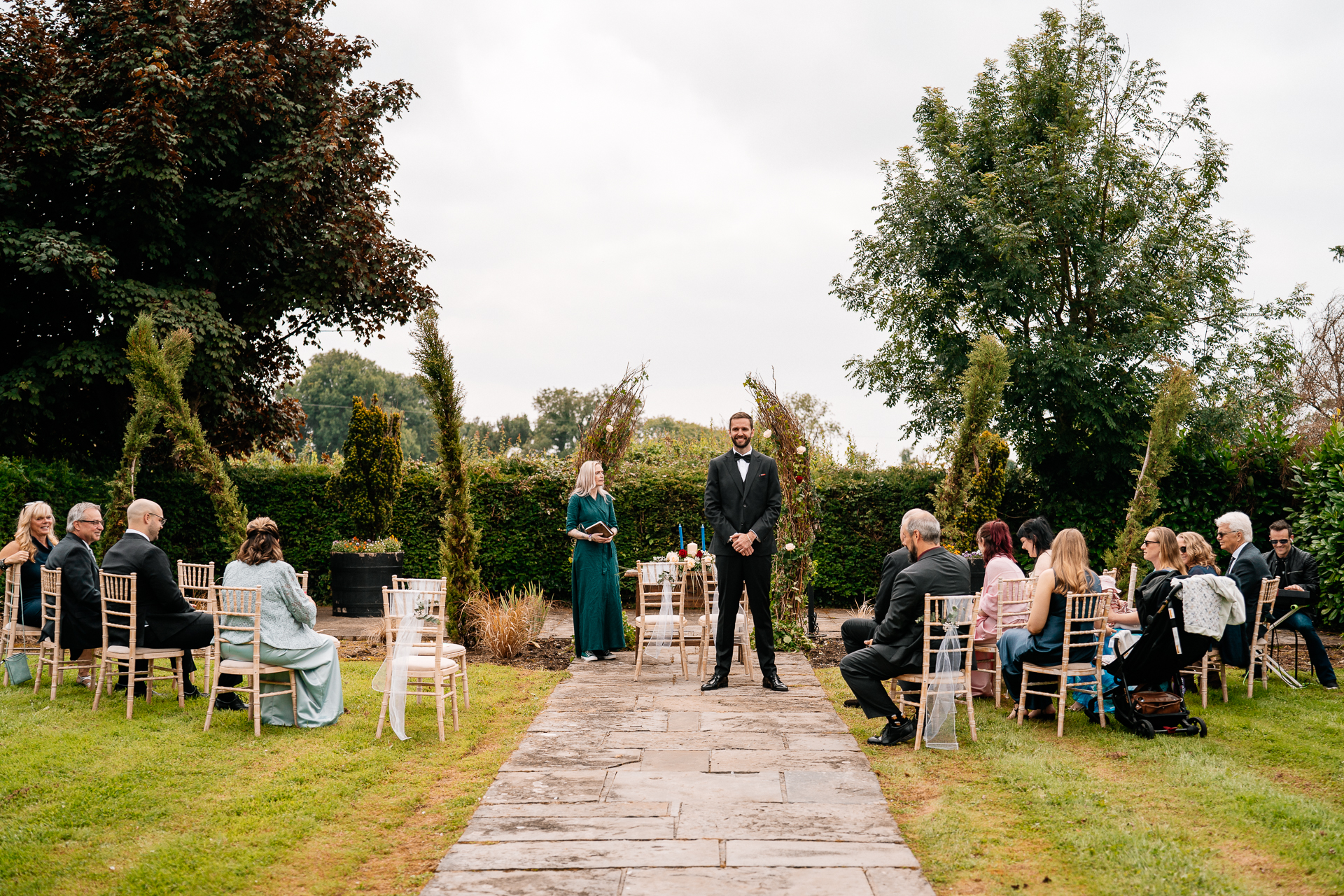 Outdoor wedding ceremony in the gardens of Cloghan Castle