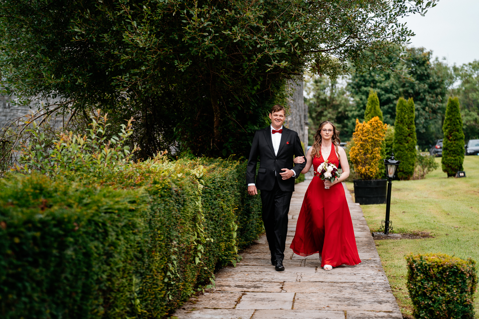 Outdoor wedding ceremony in the gardens of Cloghan Castle