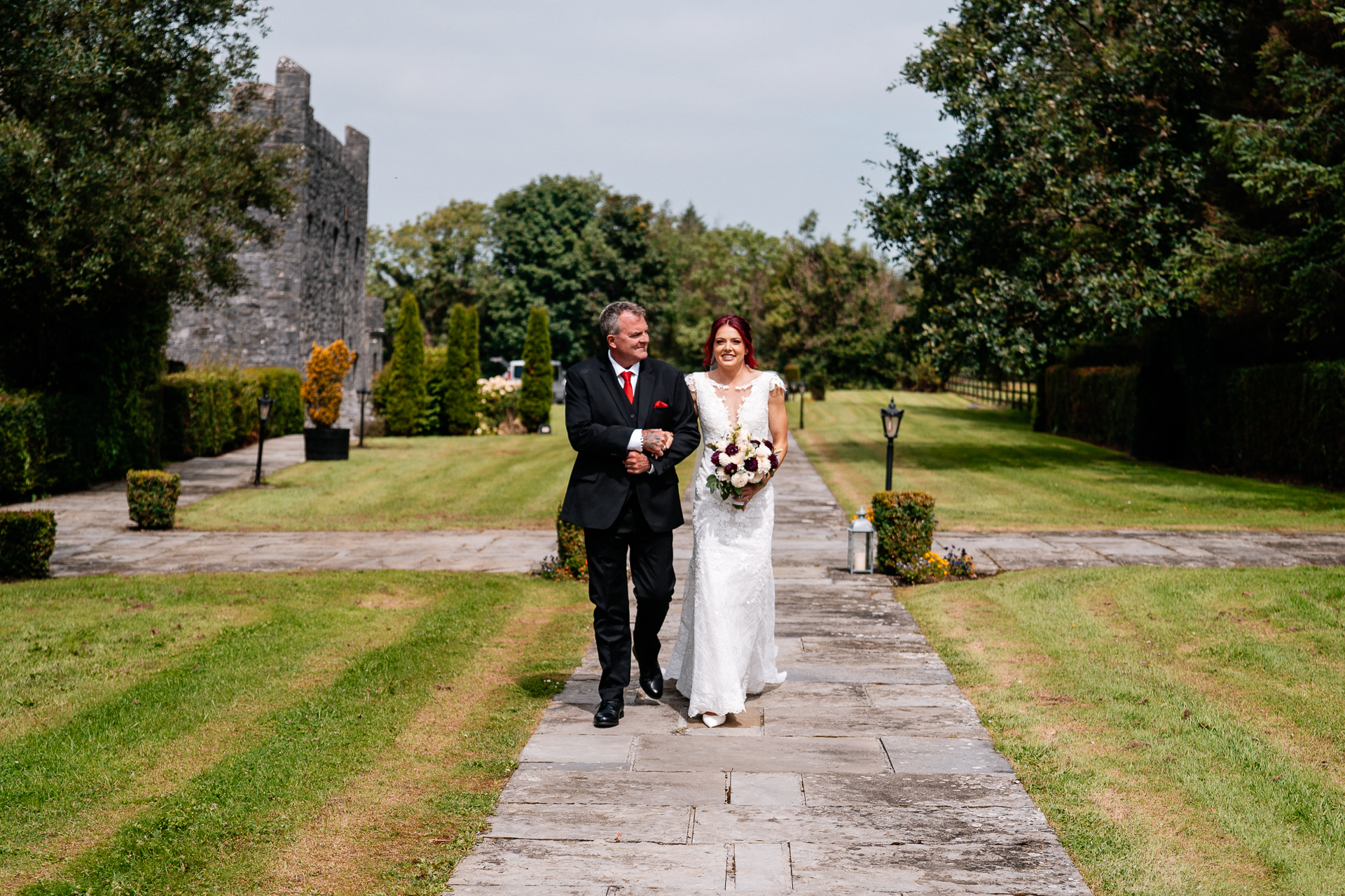 Outdoor wedding ceremony in the gardens of Cloghan Castle