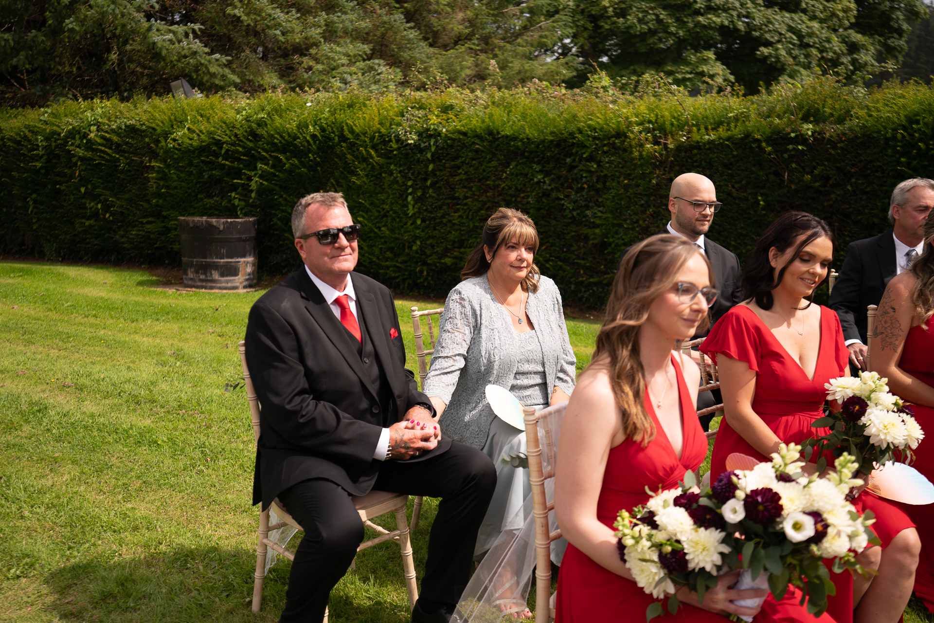 Outdoor wedding ceremony in the gardens of Cloghan Castle