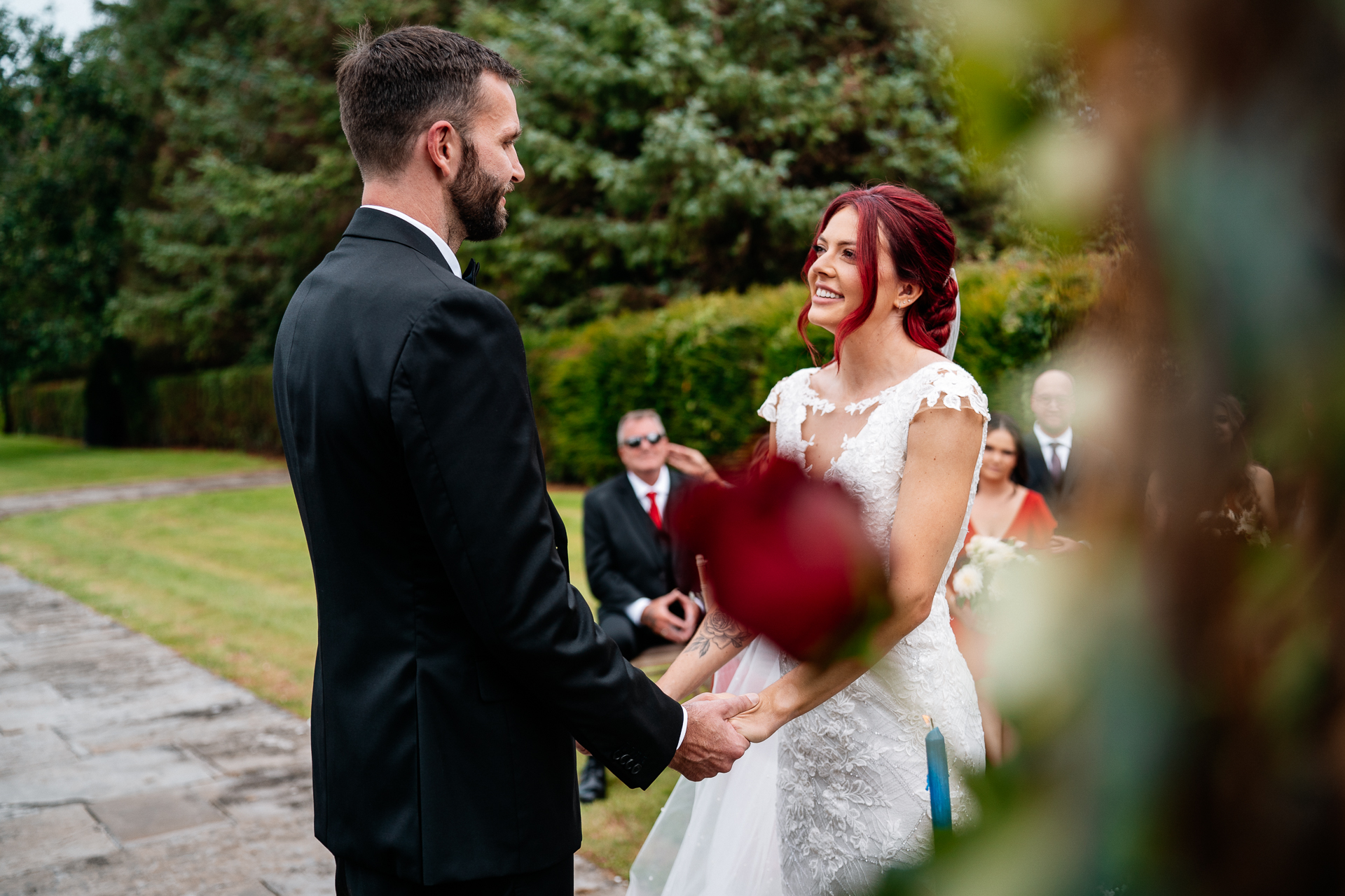 Outdoor wedding ceremony in the gardens of Cloghan Castle