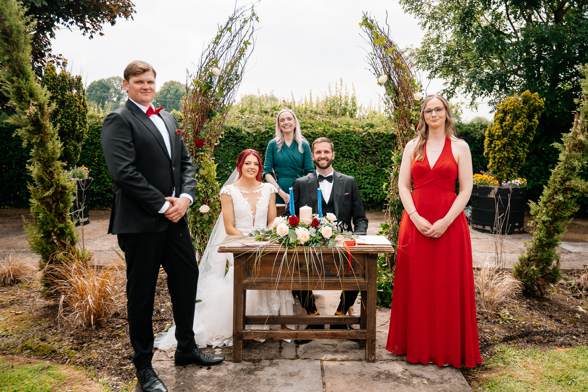 Outdoor wedding ceremony in the gardens of Cloghan Castle