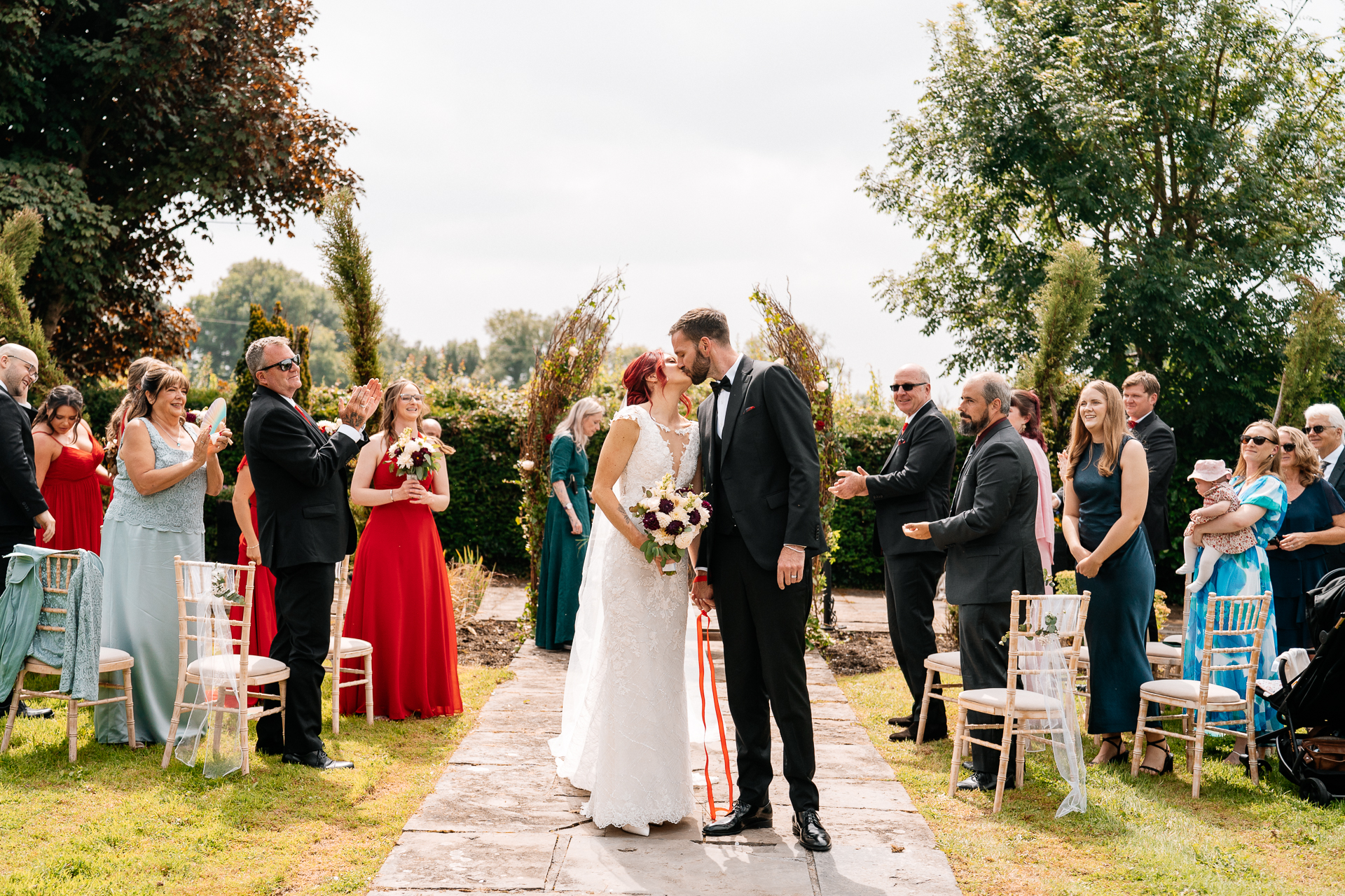 Outdoor wedding ceremony in the gardens of Cloghan Castle