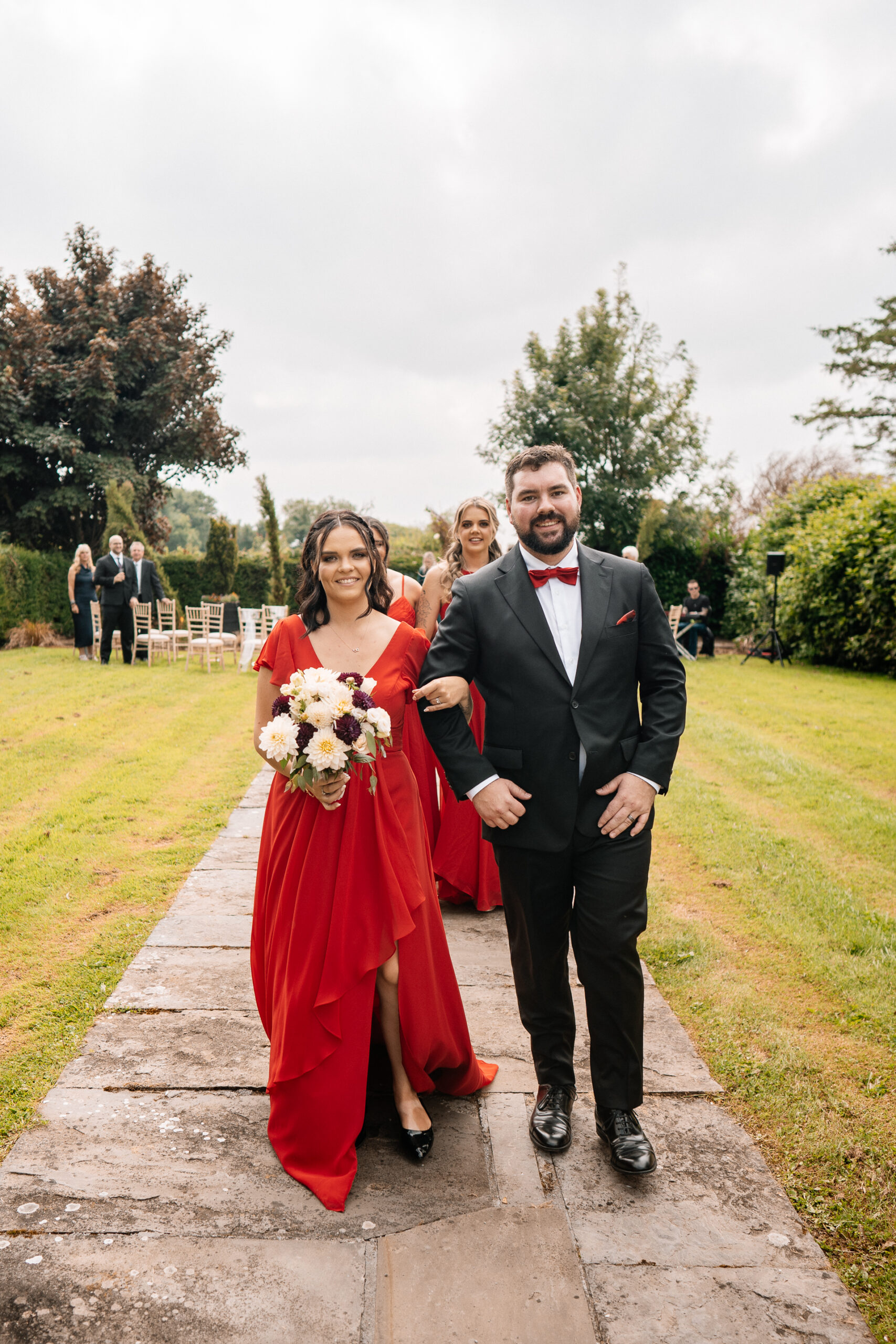 Outdoor wedding ceremony in the gardens of Cloghan Castle