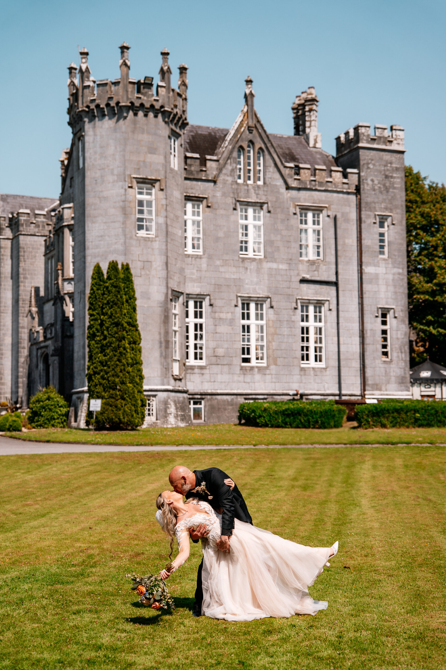 Bride and groom portrait session around the castle grounds of Kinnity Castle Hotel.