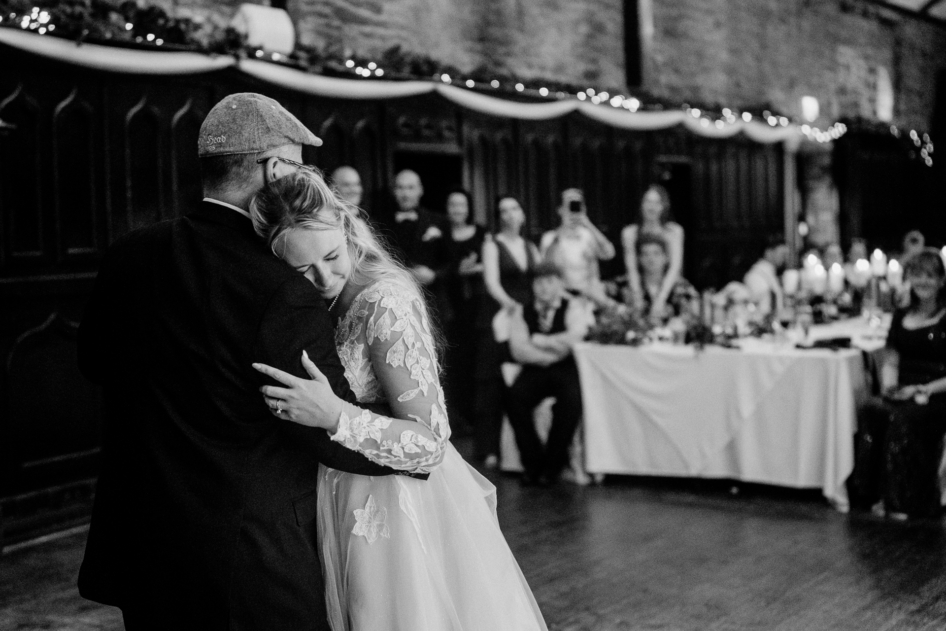 Bride and groom’s first dance and guests dancing in the cozy Dining Room at Kinnity Castle Hotel.
