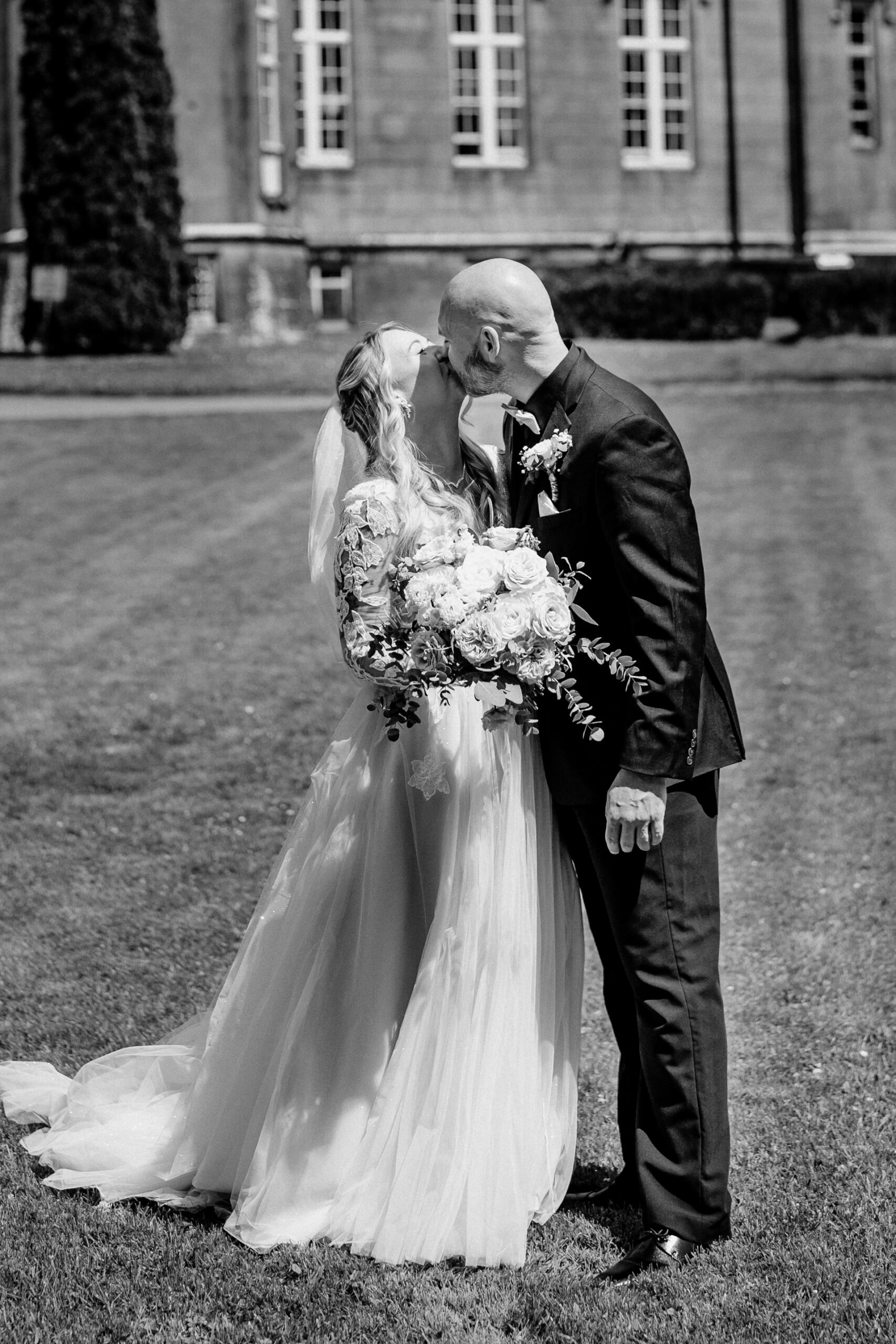 Bride and groom emotional First Look moment in front of Kinnity Castle Hotel.