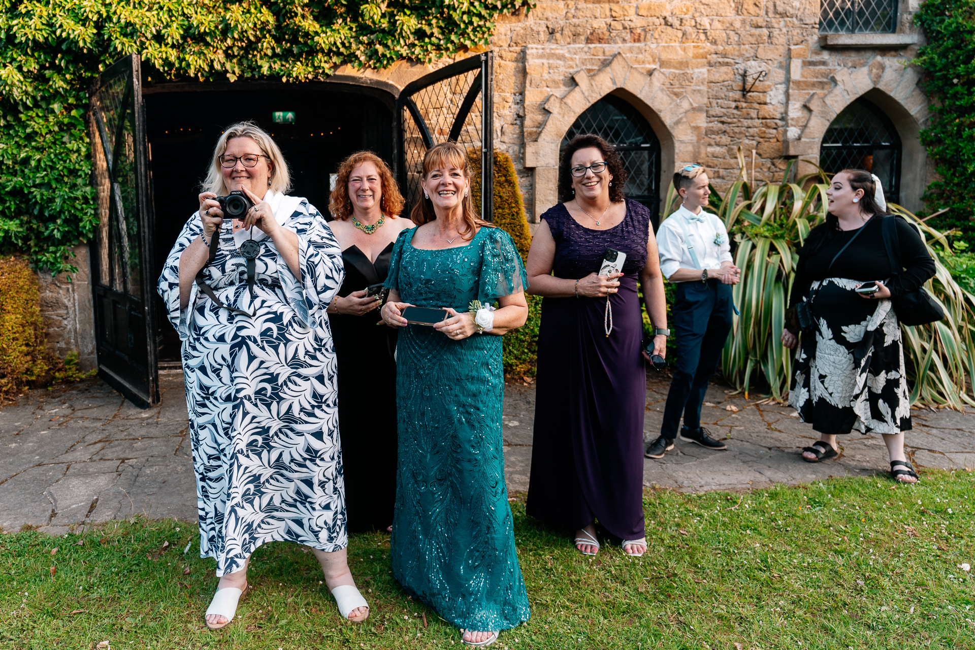Outdoor wedding ceremony in the gardens of Kinnity Castle Hotel, Ireland.