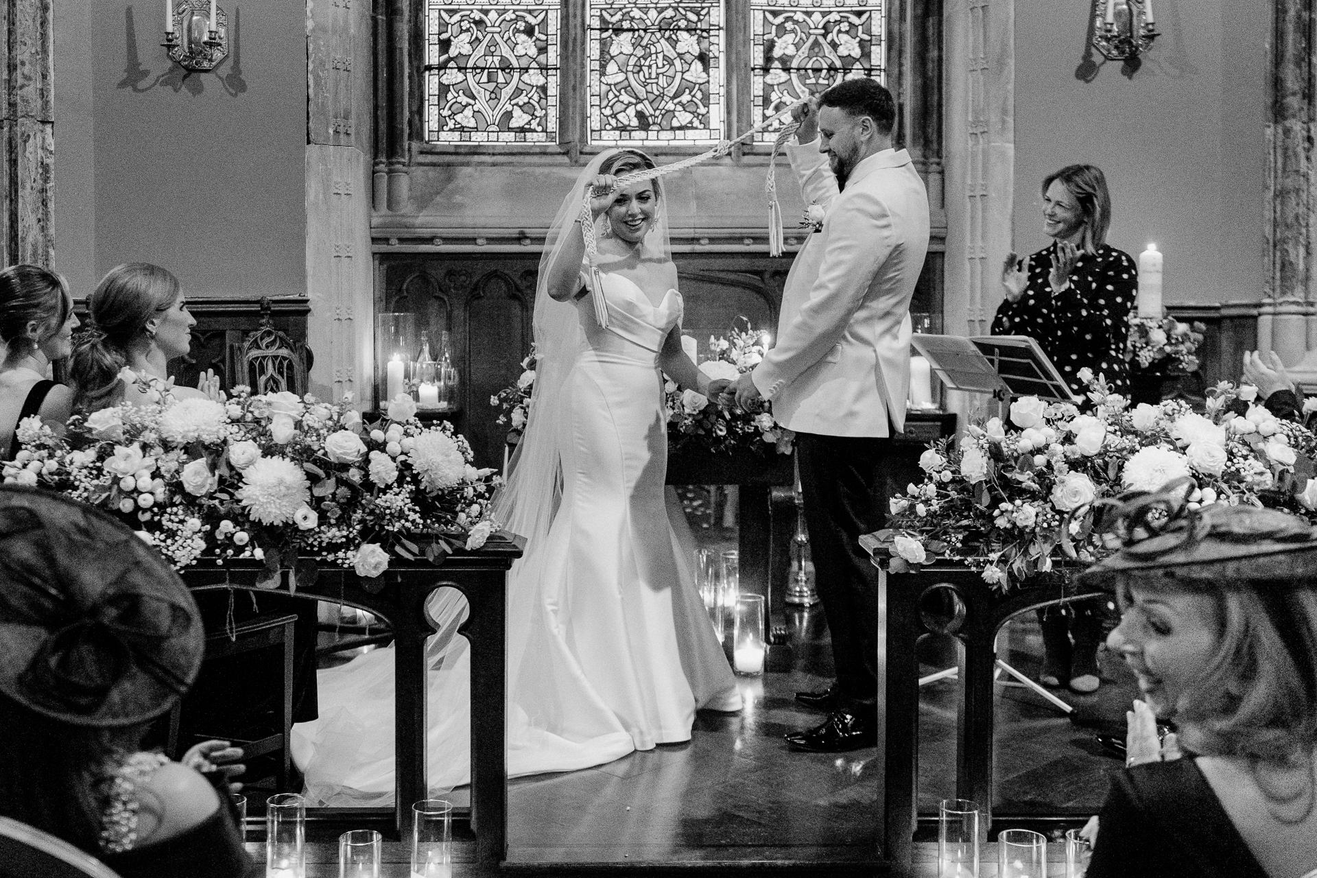 Emotional black and white wedding photo of bride and groom at the altar during Markree Castle ceremony

