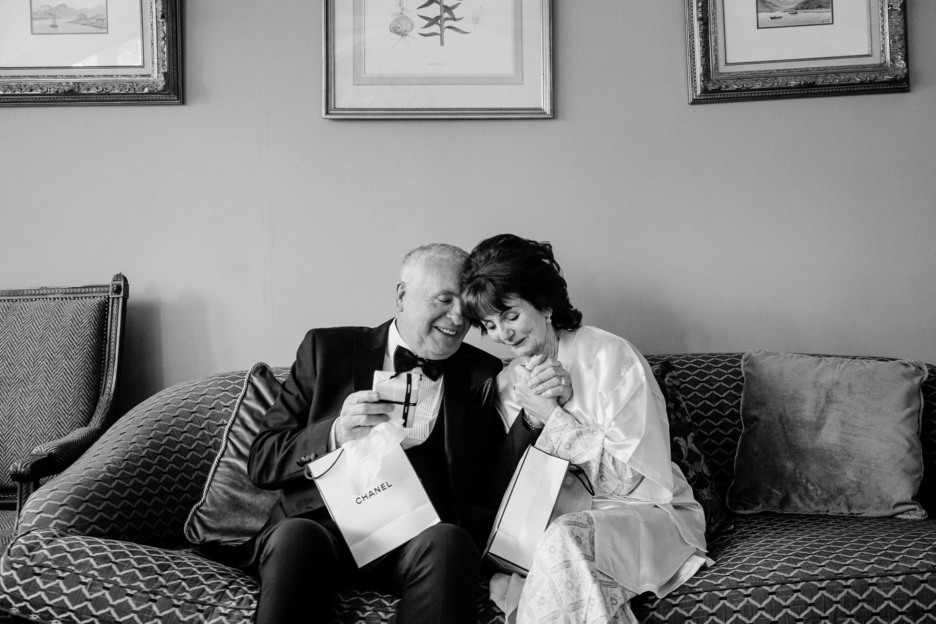 Bride and groom sharing a quiet moment on the couch before the wedding at Markree Castle

