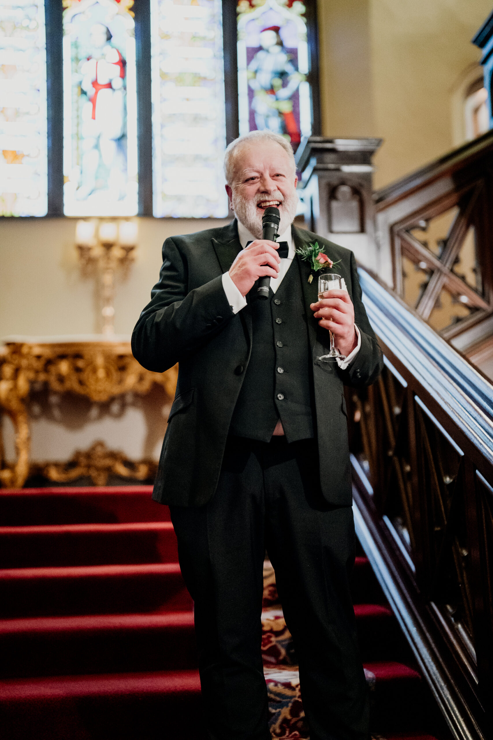 Father of the bride delivering emotional speech on the grand staircase at Markree Castle

