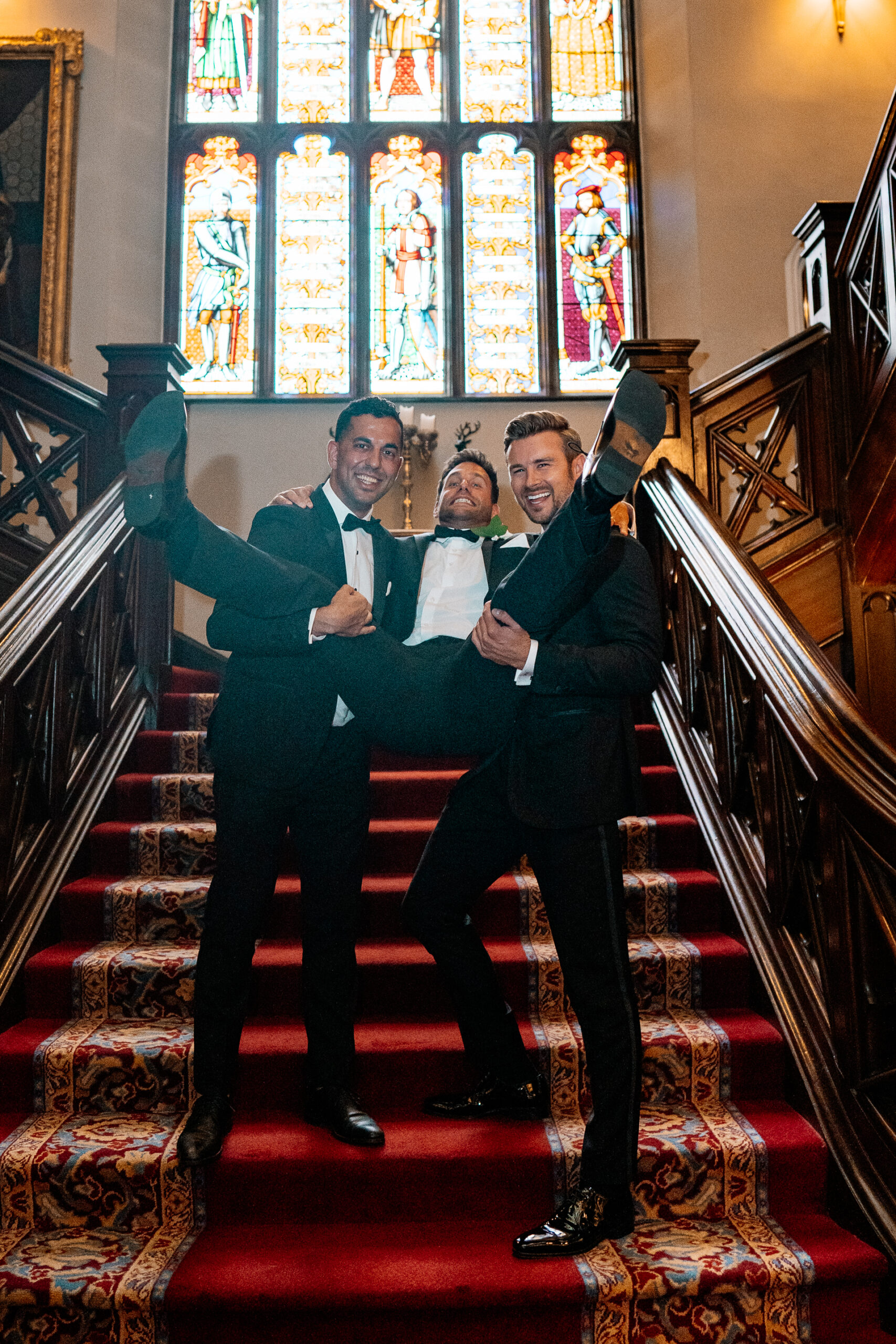 Guests enjoying the wedding reception and speeches at Markree Castle, with Irish Wolfhound Fionn joining the celebration