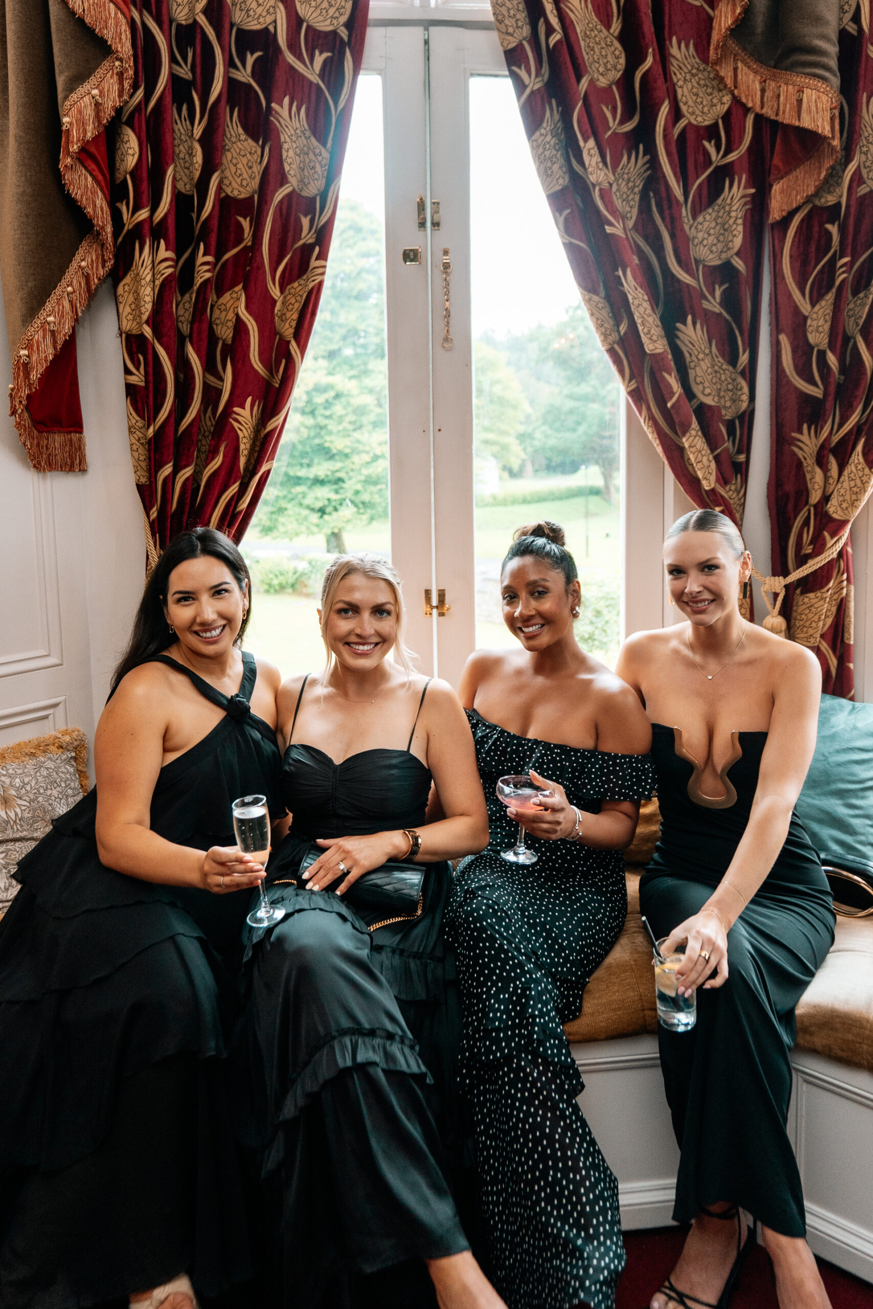 Guests enjoying the wedding reception and speeches at Markree Castle, with Irish Wolfhound Fionn joining the celebration