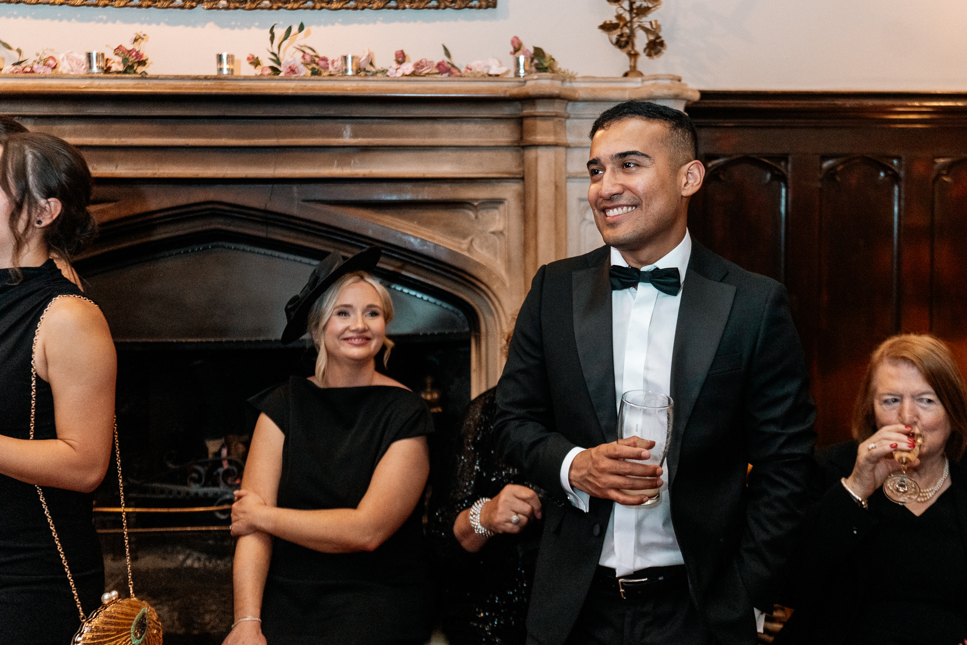 Guests enjoying the wedding reception and speeches at Markree Castle, with Irish Wolfhound Fionn joining the celebration