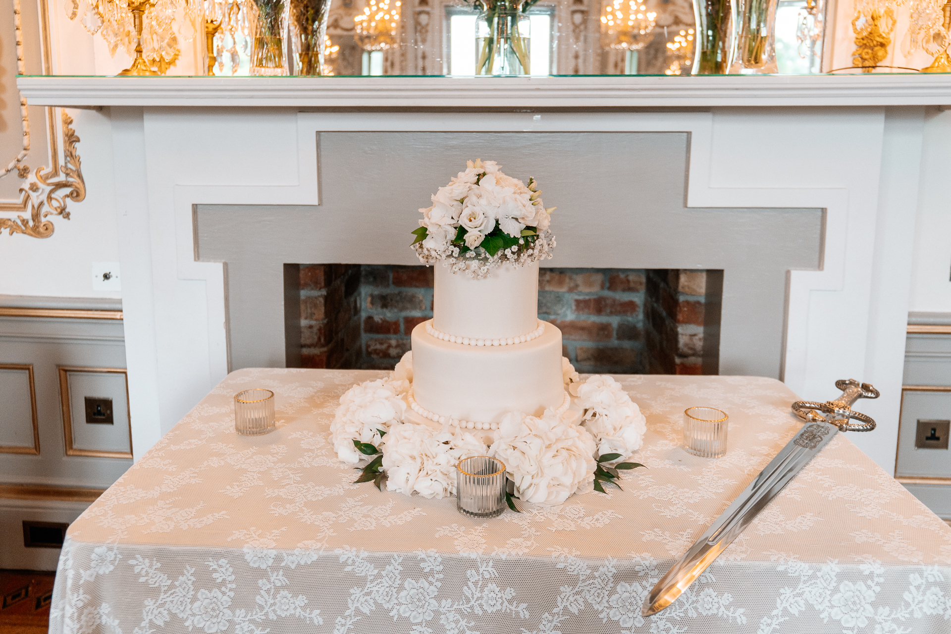 Candid wedding dinner, cake cutting, and live music at Markree Castle dining room
