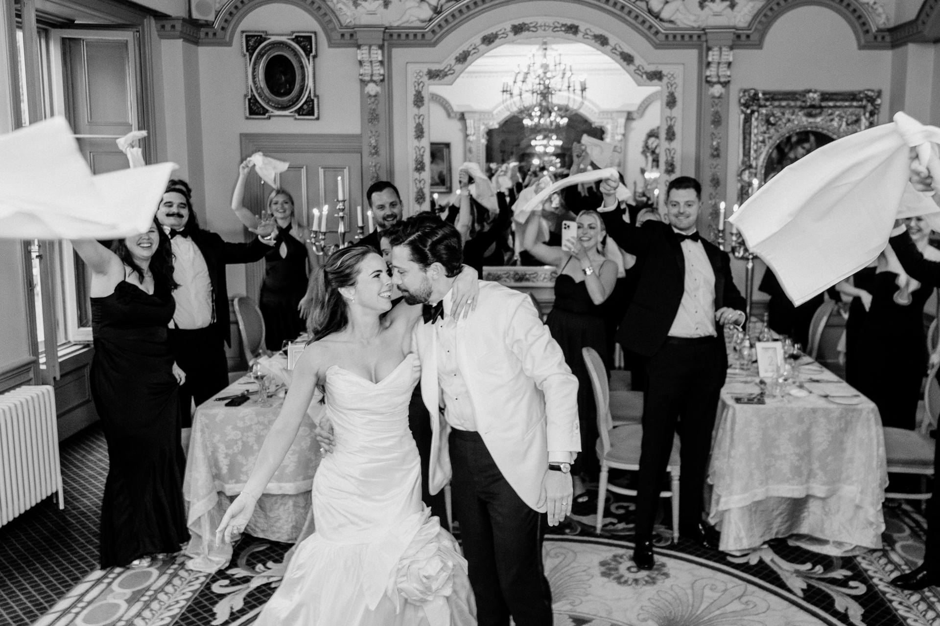 Candid wedding dinner, cake cutting, and live music at Markree Castle dining room
