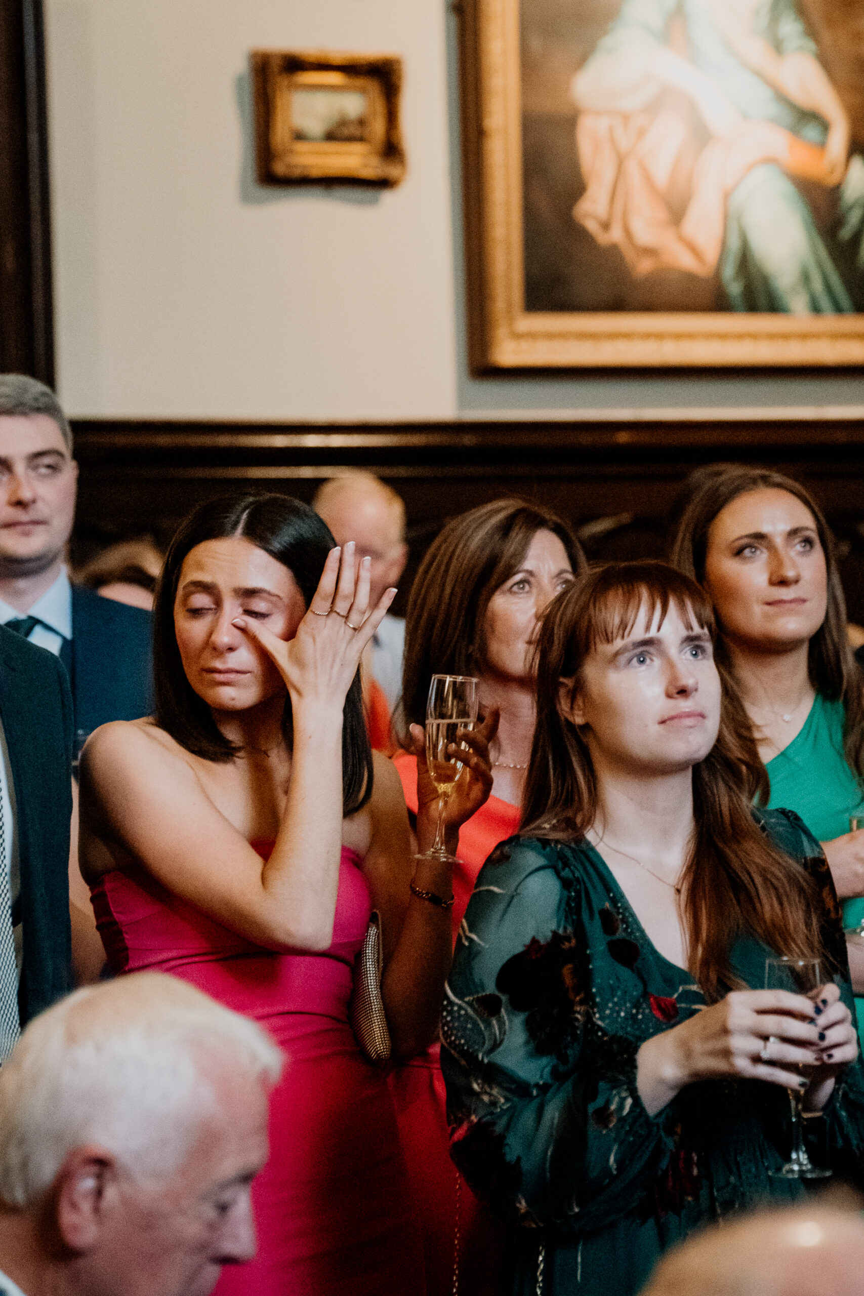 Wedding guests reacting to a surprise story during speech at Markree Castle

