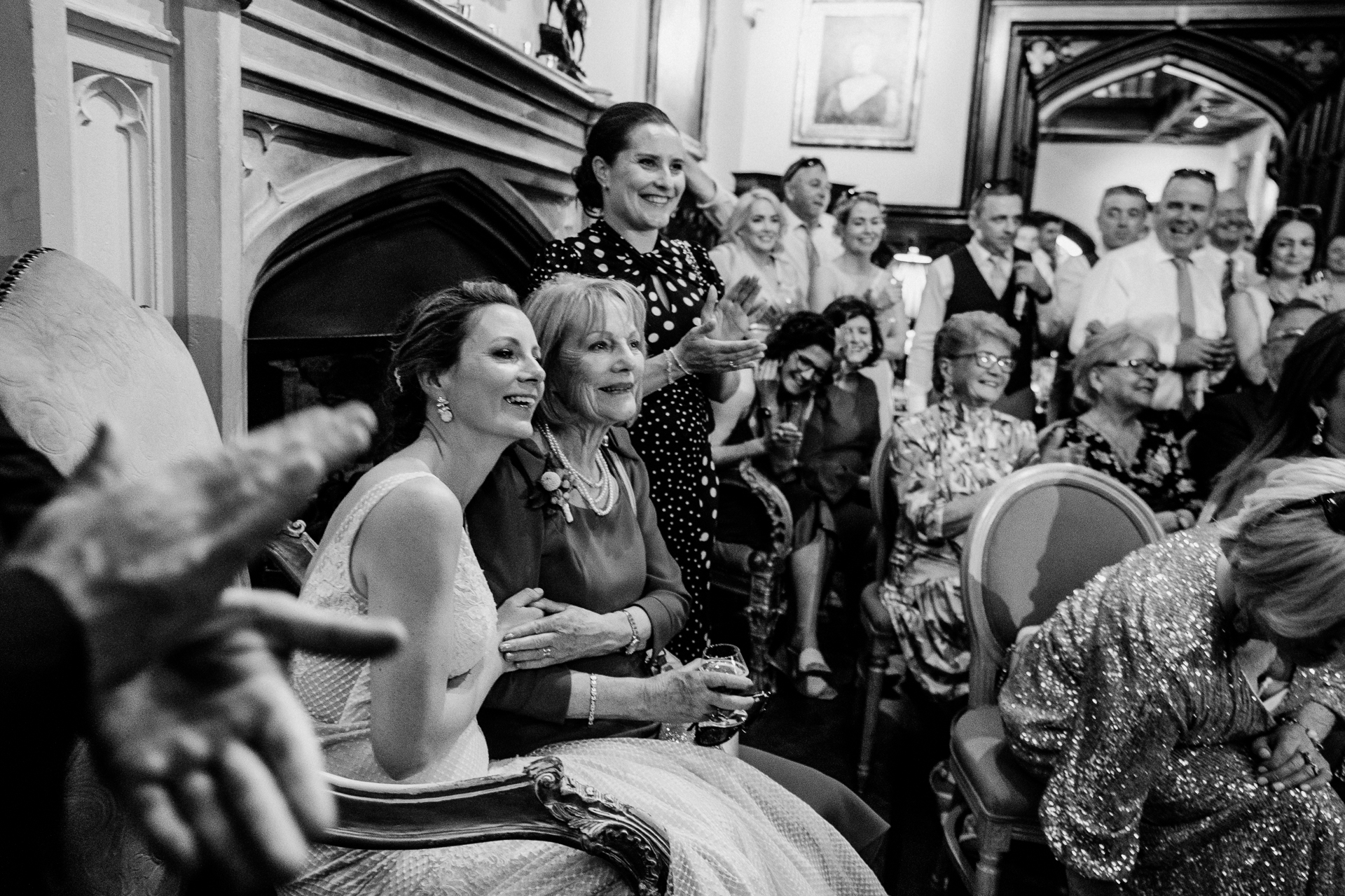 Wedding guests laughing during a best man speech at Markree Castle

