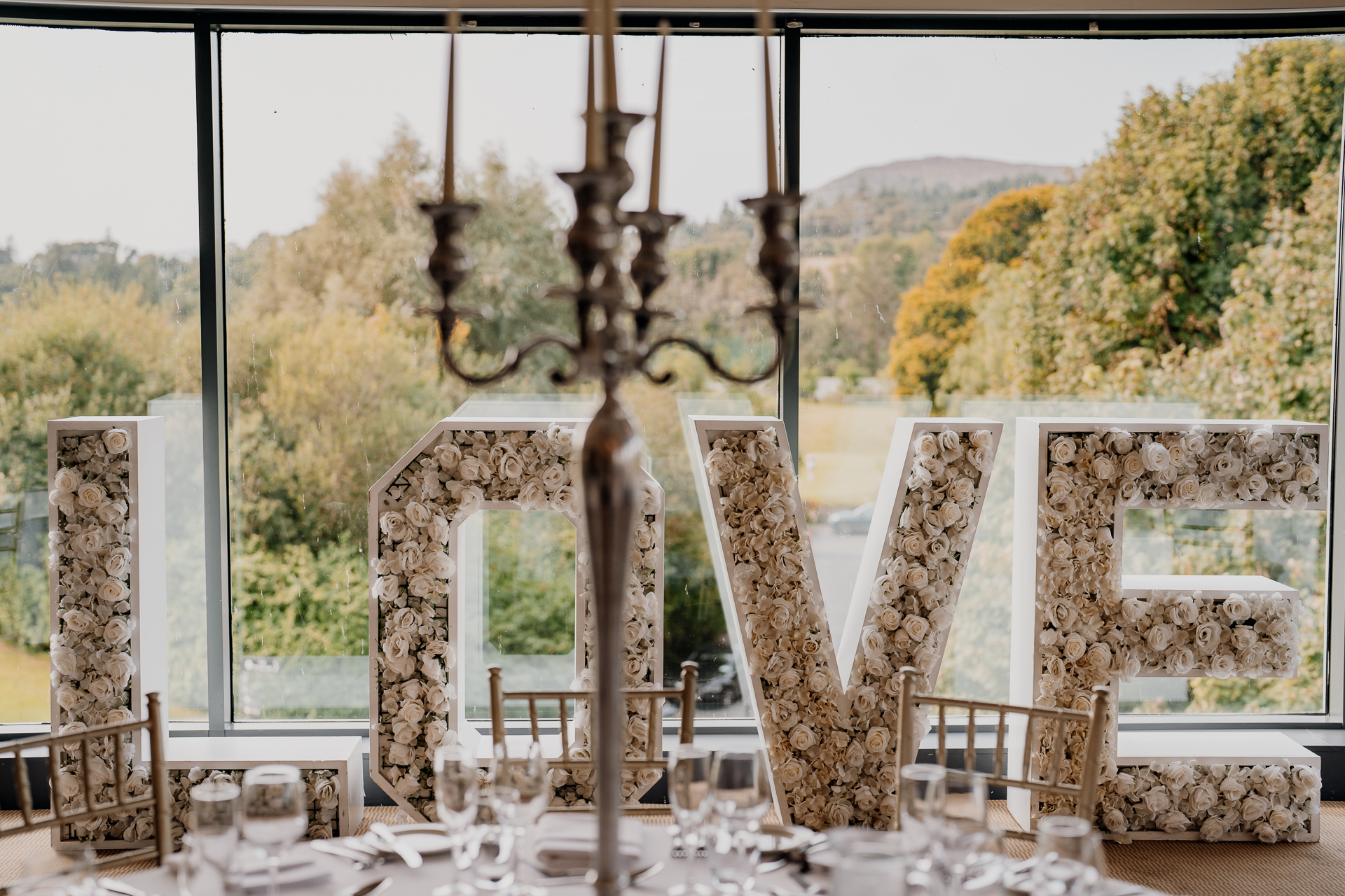 Castle Dargan wedding reception dining room with panoramic views Bride and groom portraits inside Castle Dargan Estate dining room Elegant Castle Dargan wedding dining room setup in Sligo