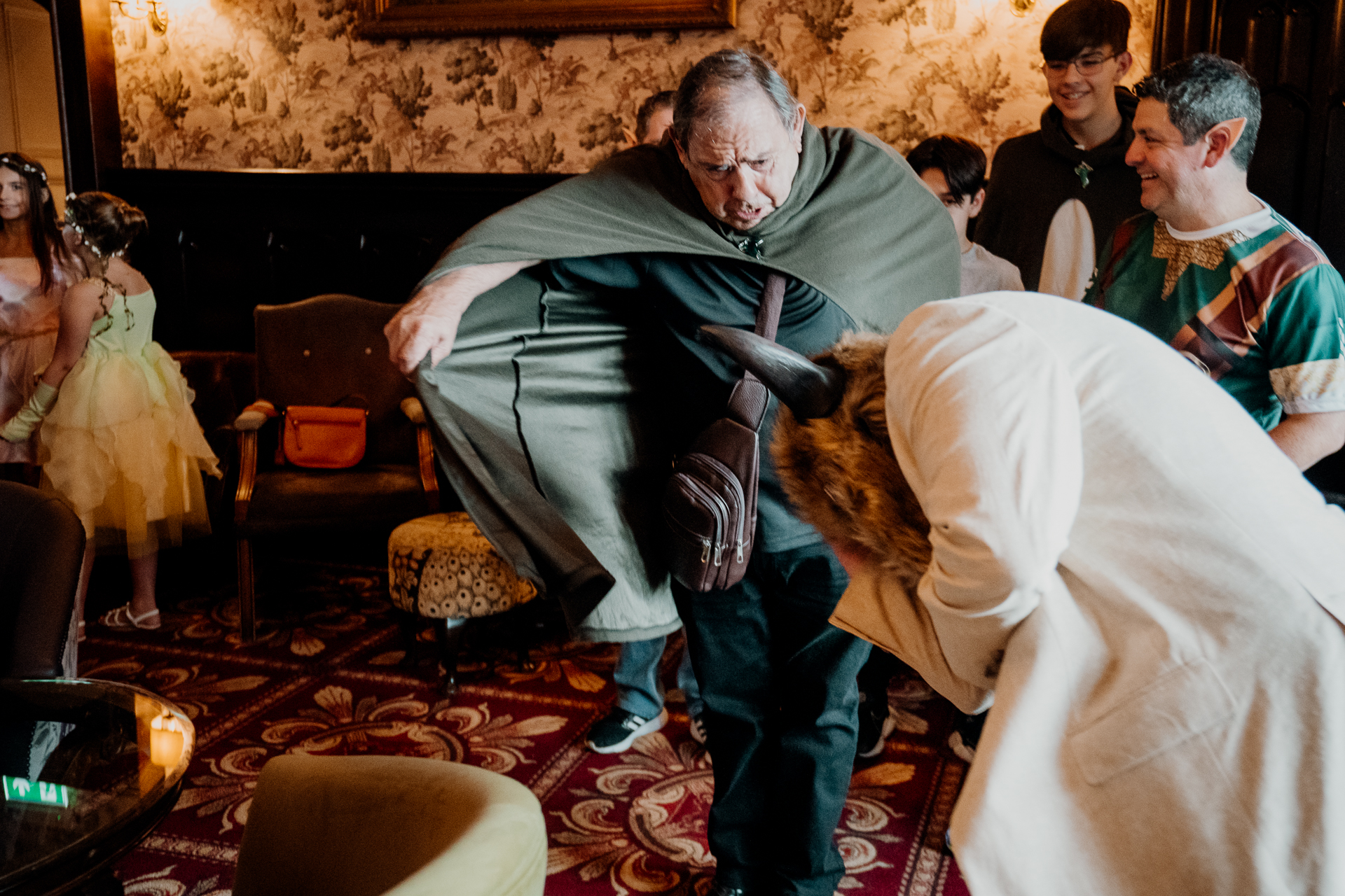 Guests dancing in fantasy-inspired costumes during rehearsal dinner at Markree Castle, Sligo, Ireland